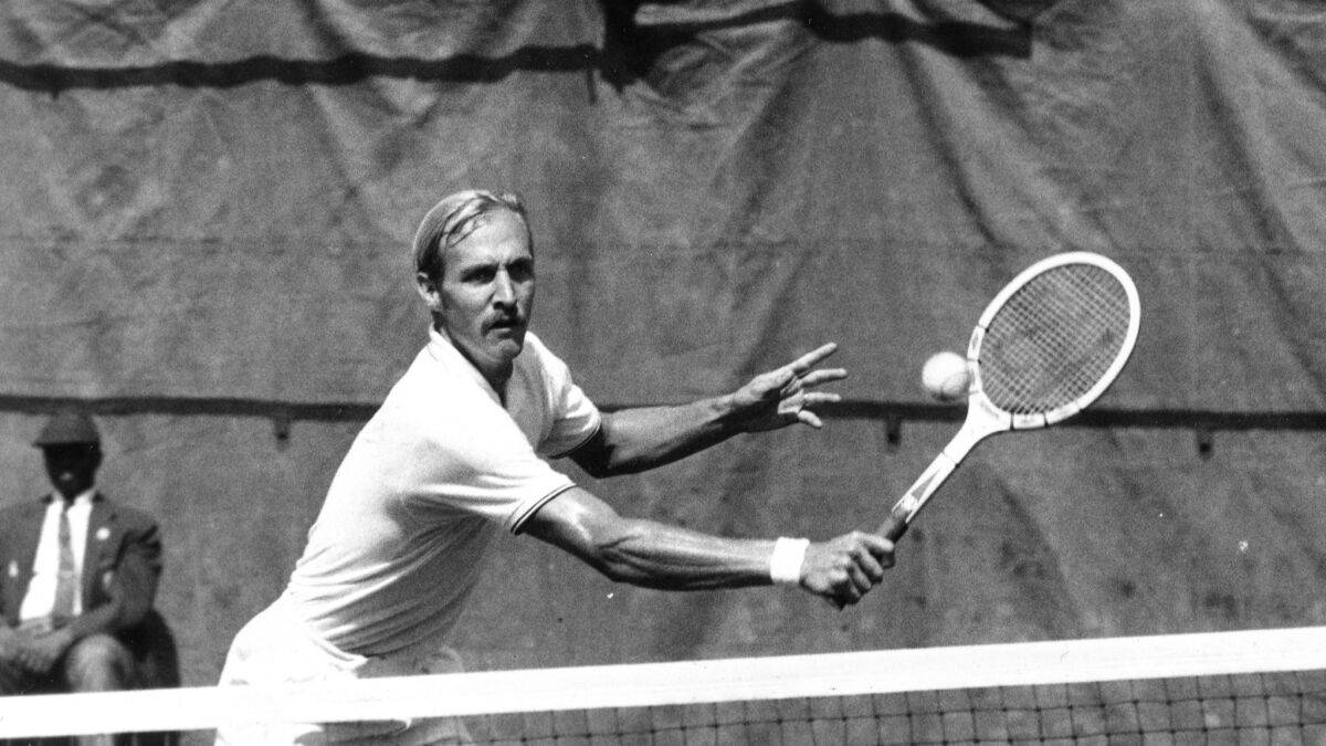 Stan Smith In Action On The Tennis Court Wallpaper