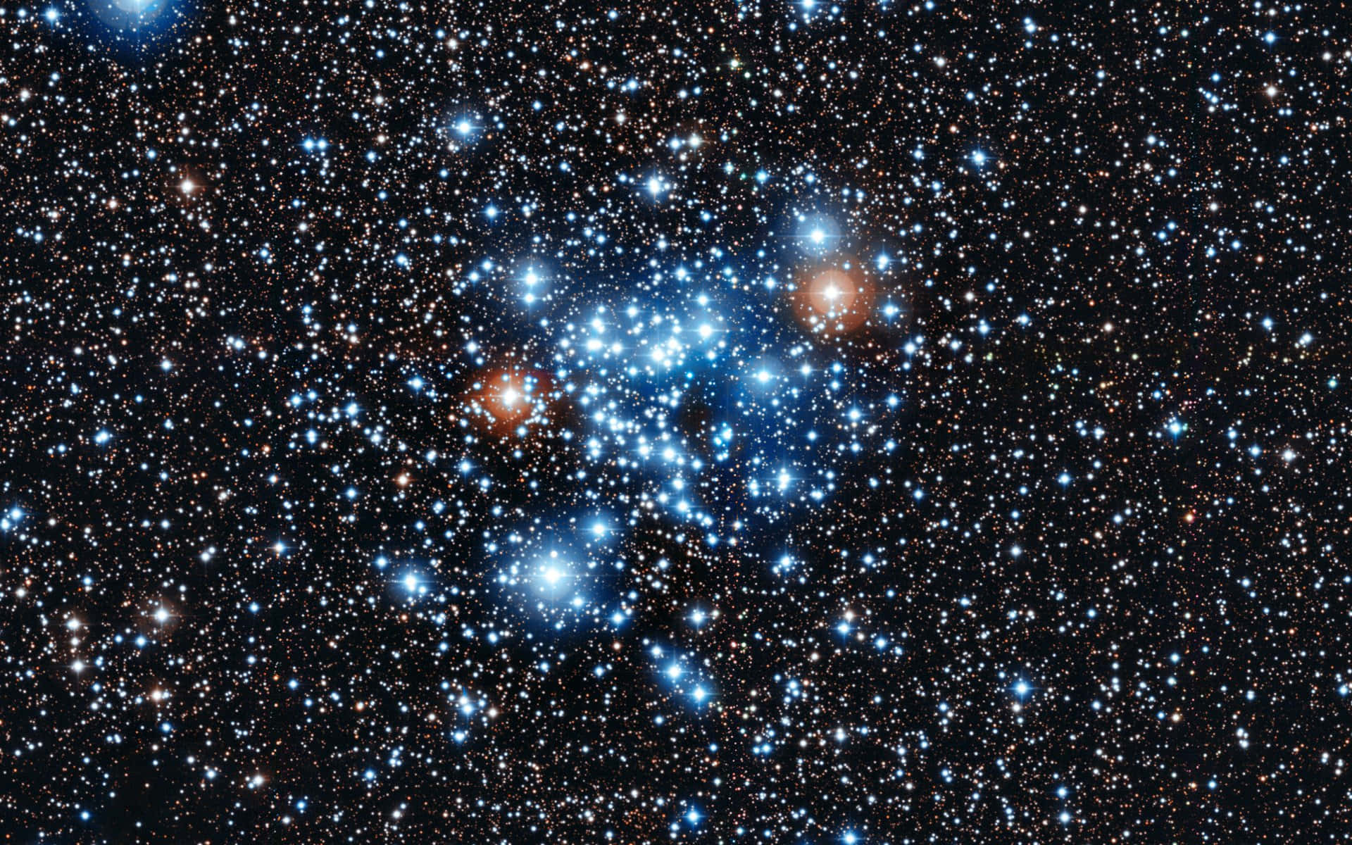Caption: A Majestic Star Cluster Lighting up the Night Sky Wallpaper