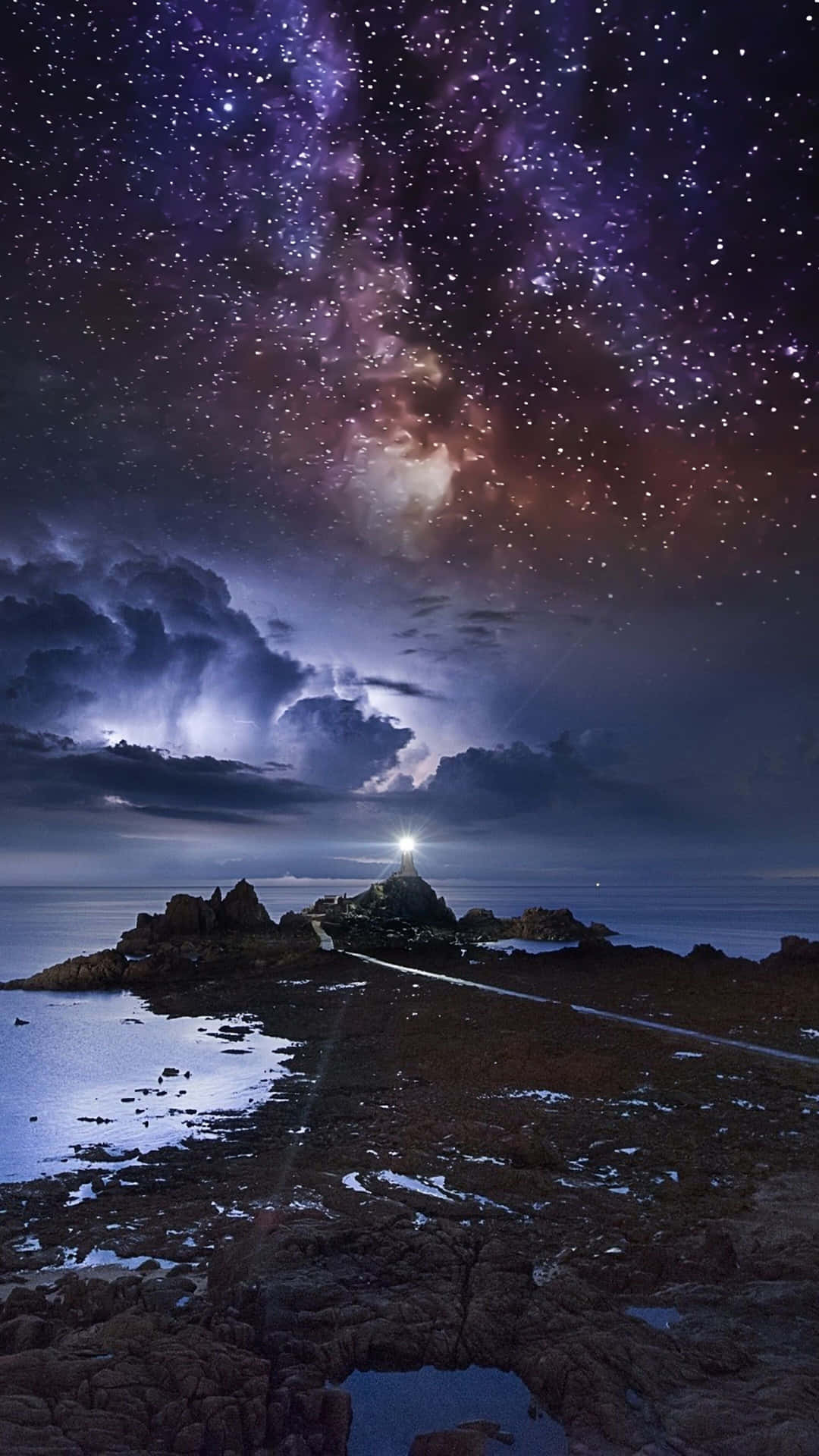 Star Sky With A Lighthouse Wallpaper