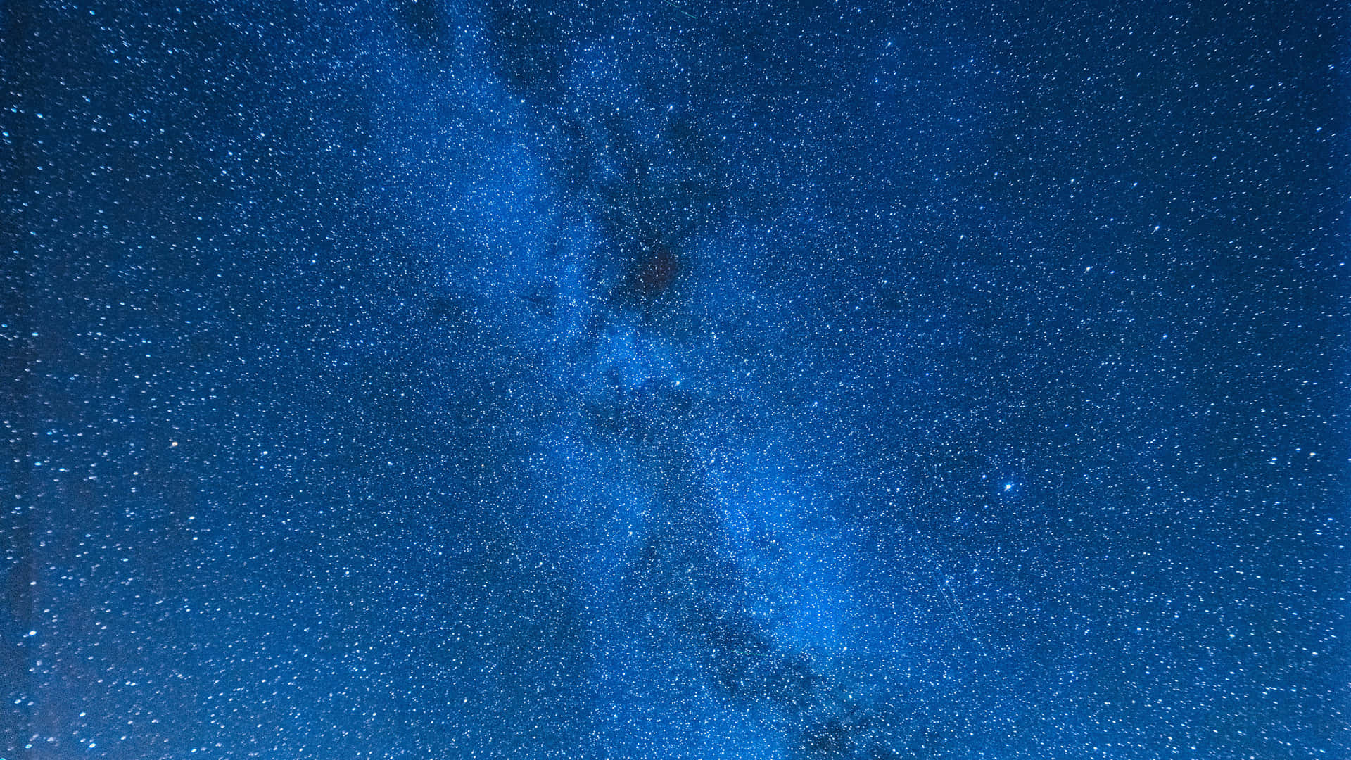 Look Up and Be Amazed at the Star Filled Sky Wallpaper