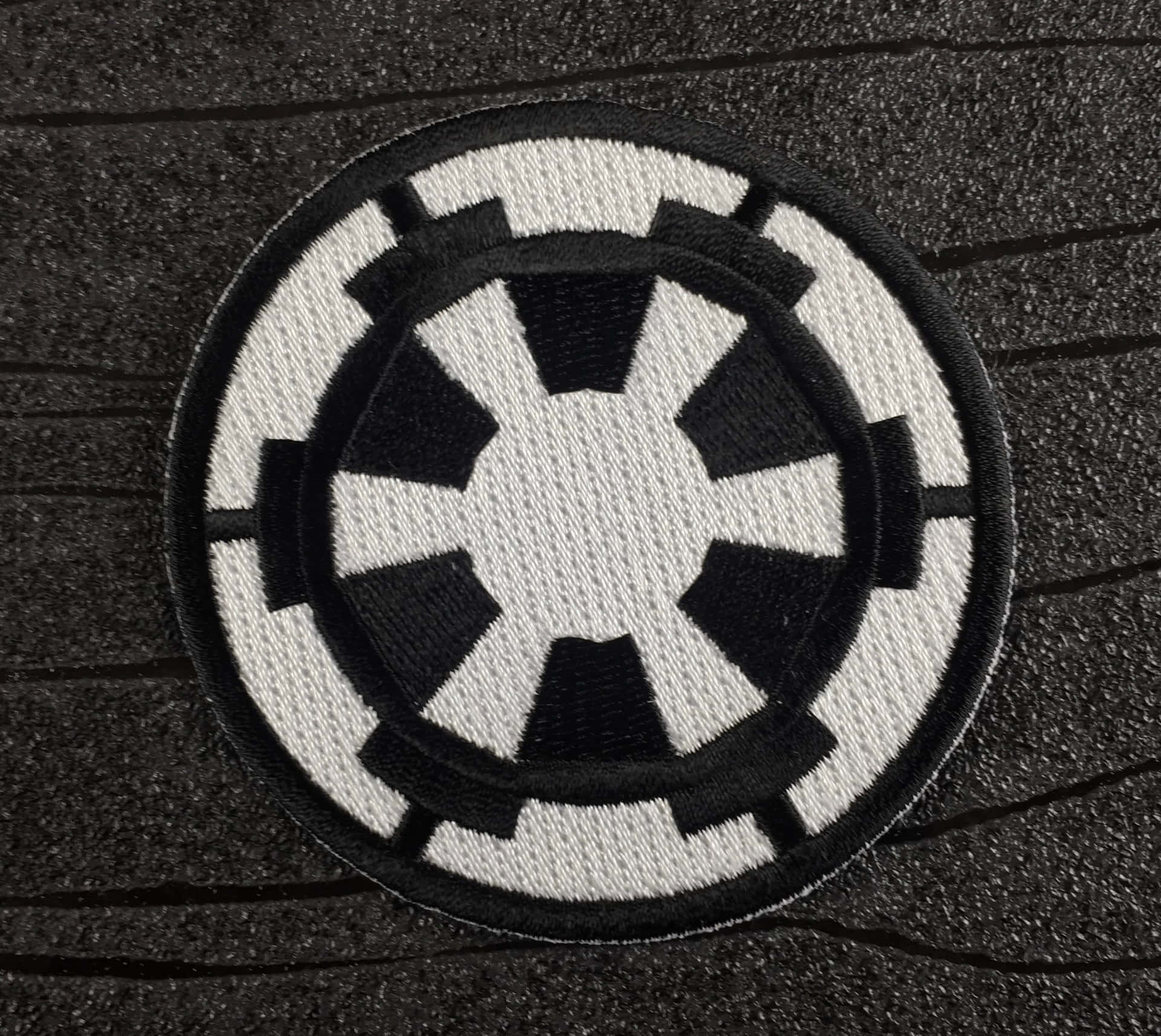 Darth Vader Helmet with Star Wars Empire Logo Wallpaper