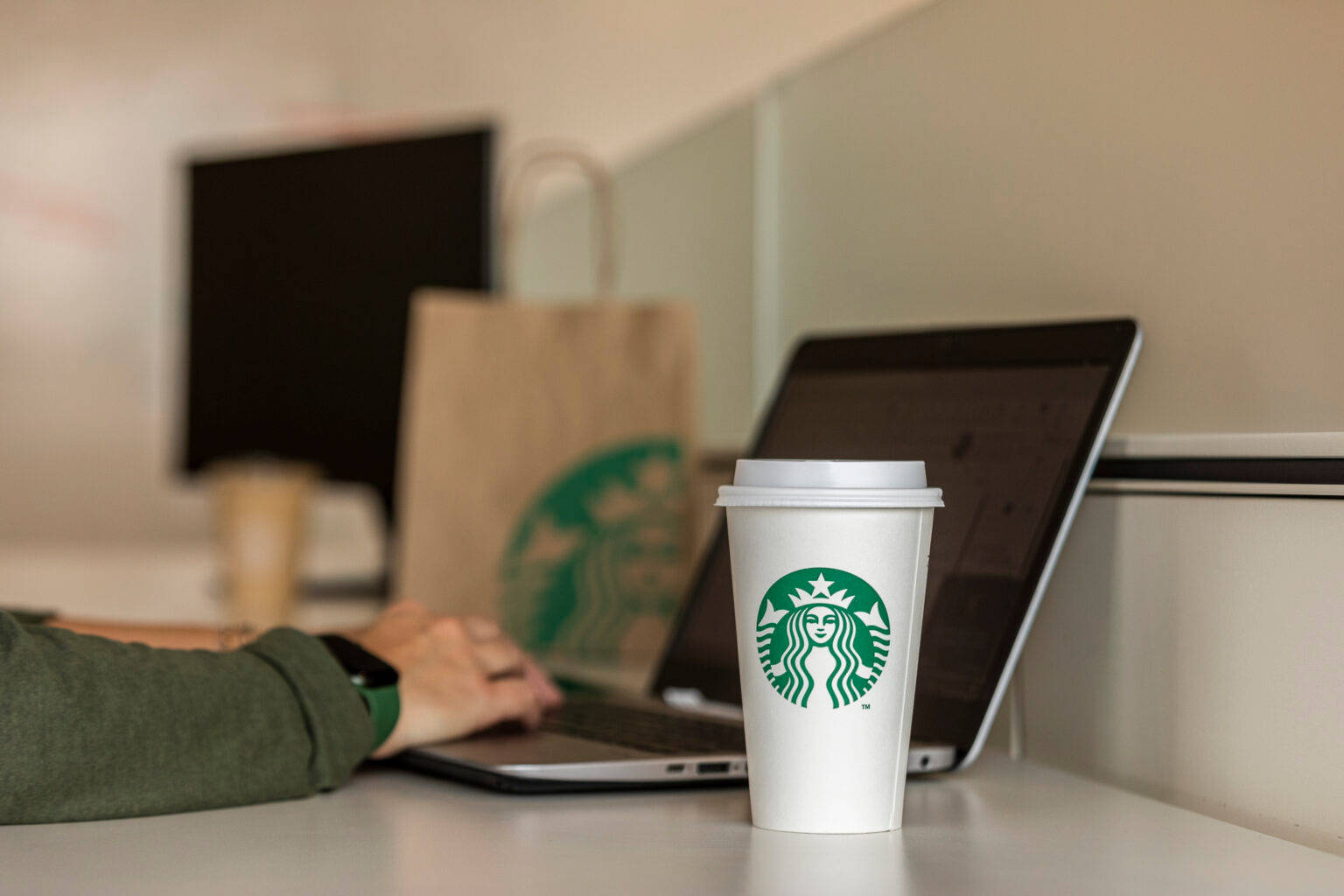 Starbucks Coffee While Working On Laptop Wallpaper