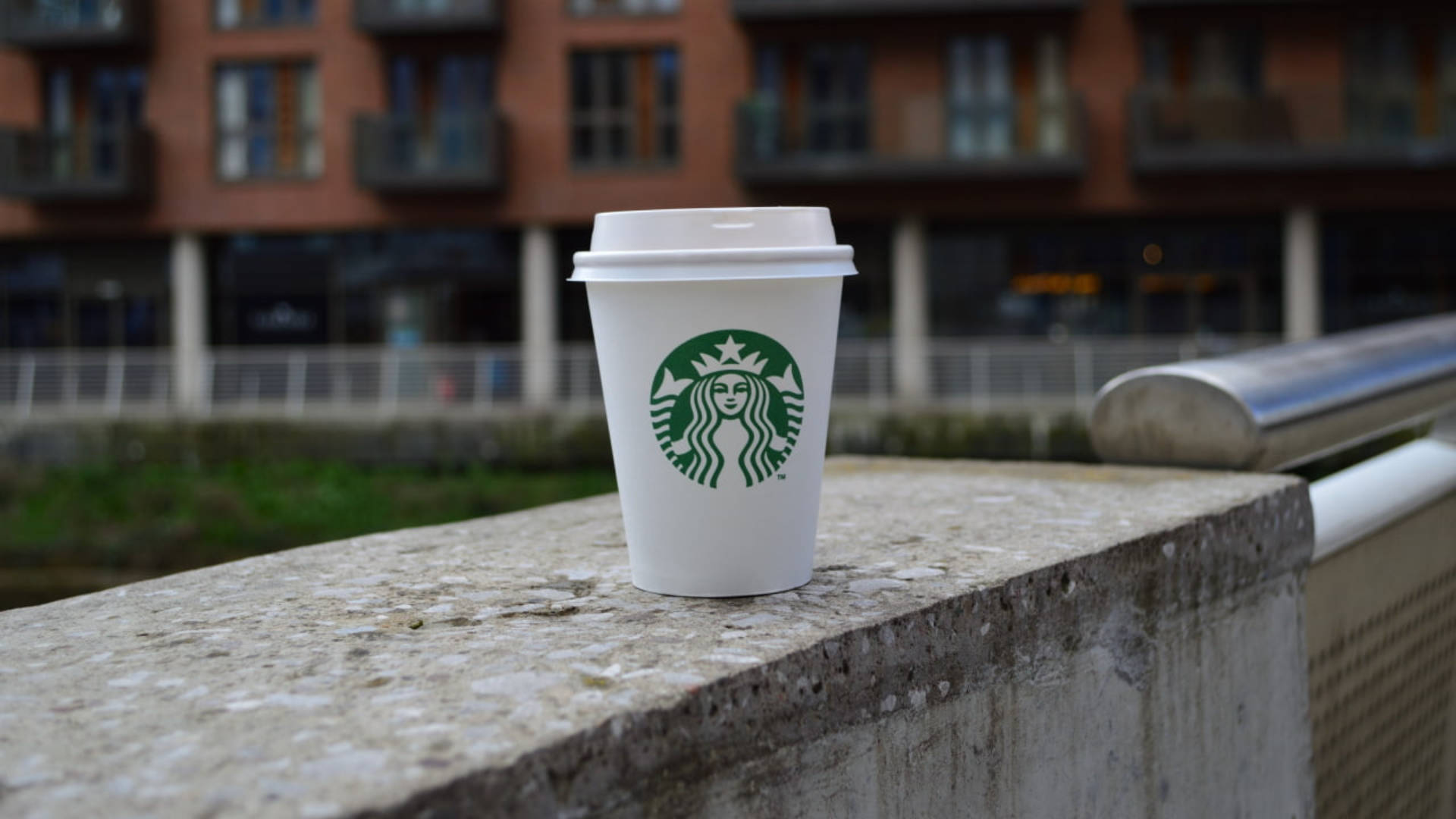Starbucks Cup On Concrete Wallpaper
