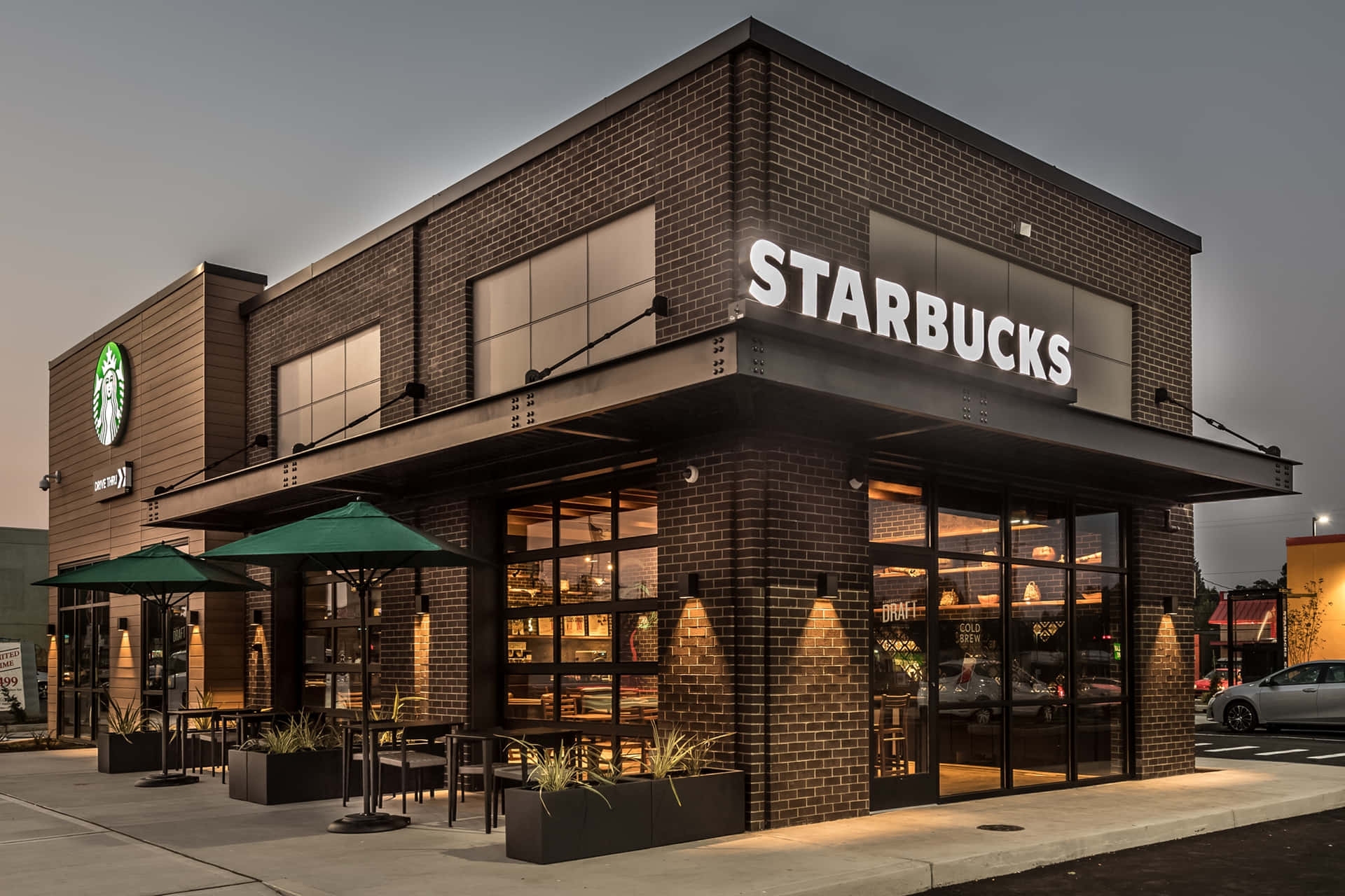 Starbucks - A Building With A Black Exterior