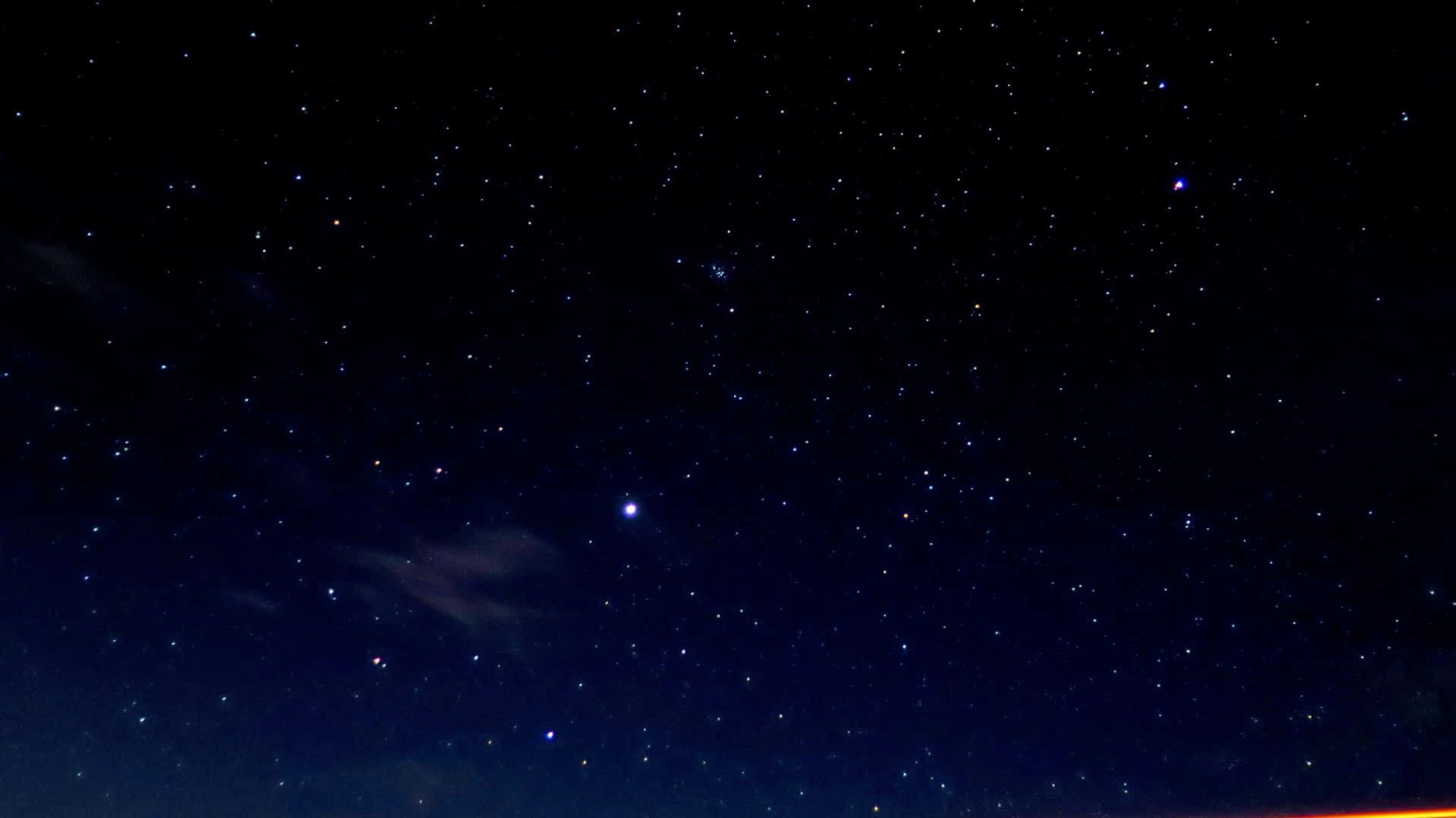 A beautiful night sky studded with stars.