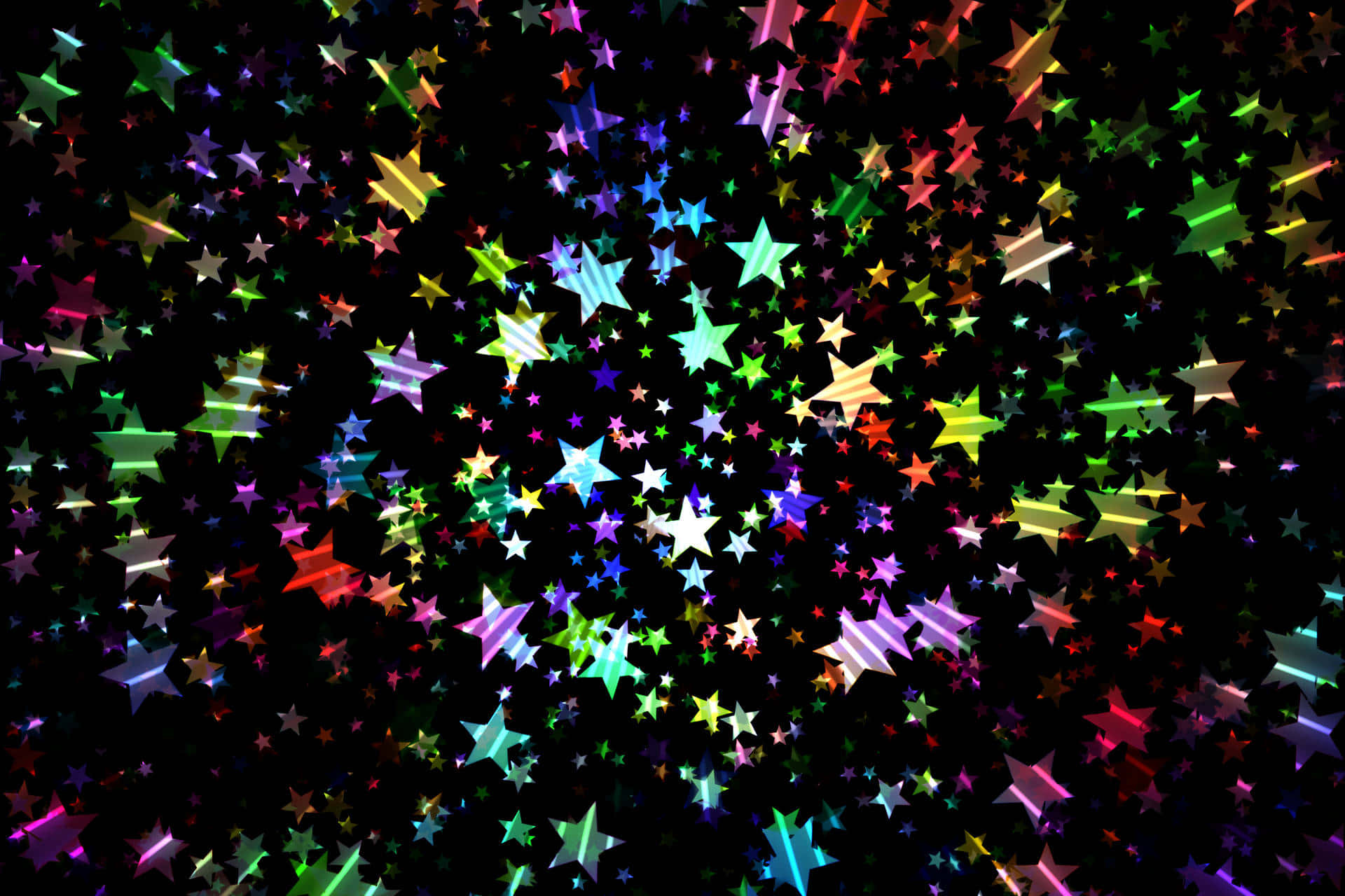 Et farverigt stjernebaggrund med mange stjerner spredt rundt på overfladen Wallpaper