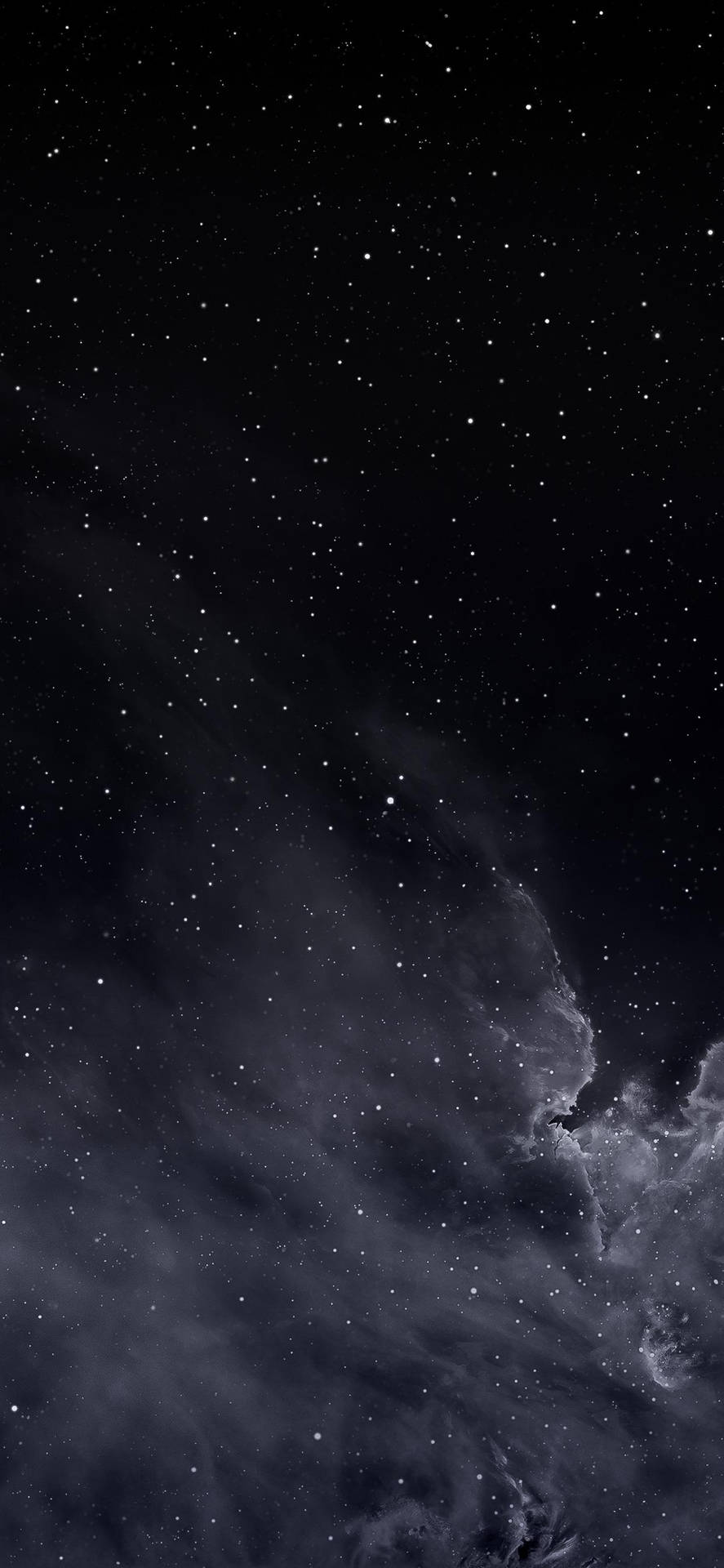 Stars In Cloudy Sky In Dark Mode Wallpaper