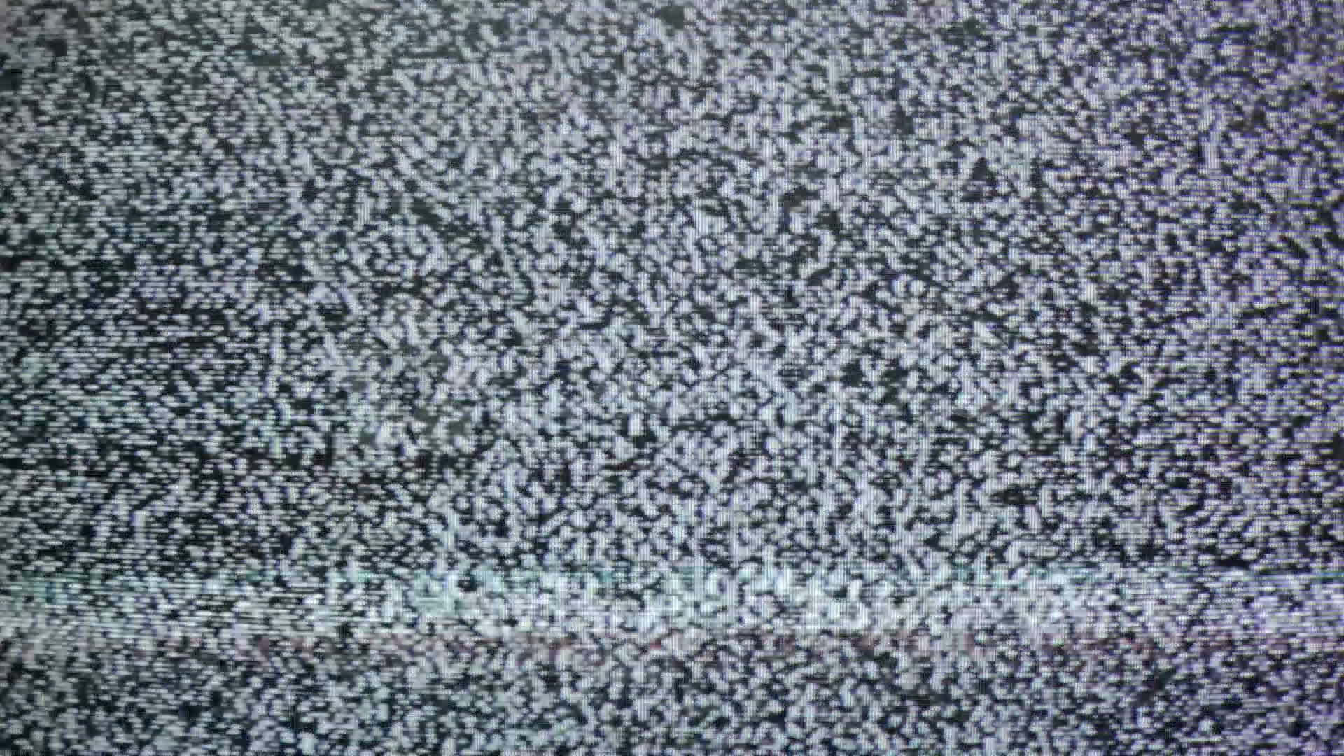 A Close Up Of A Television Screen With A Black Background