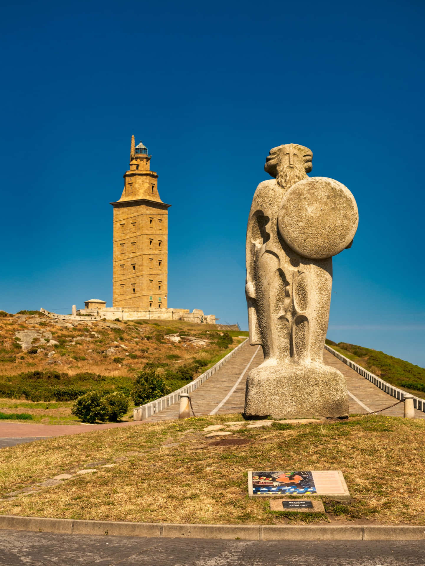 Statue Beside The Tower Of Hercules Wallpaper