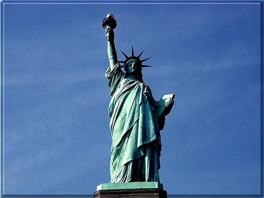 Download Statue Of Liberty Clear Blue Sky Wallpaper | Wallpapers.com