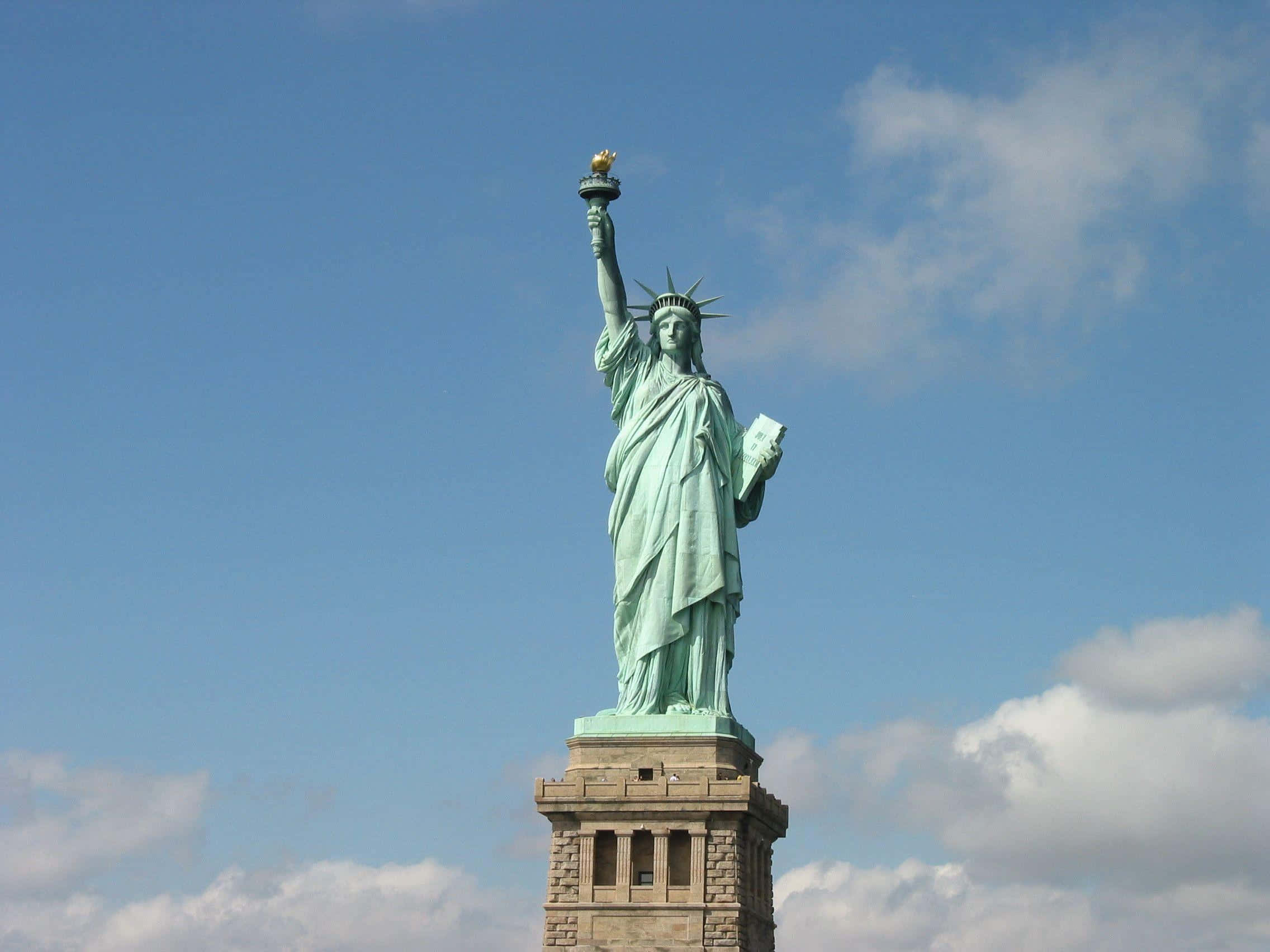 The larger-than-life Statue of Liberty, a symbol of freedom and democracy