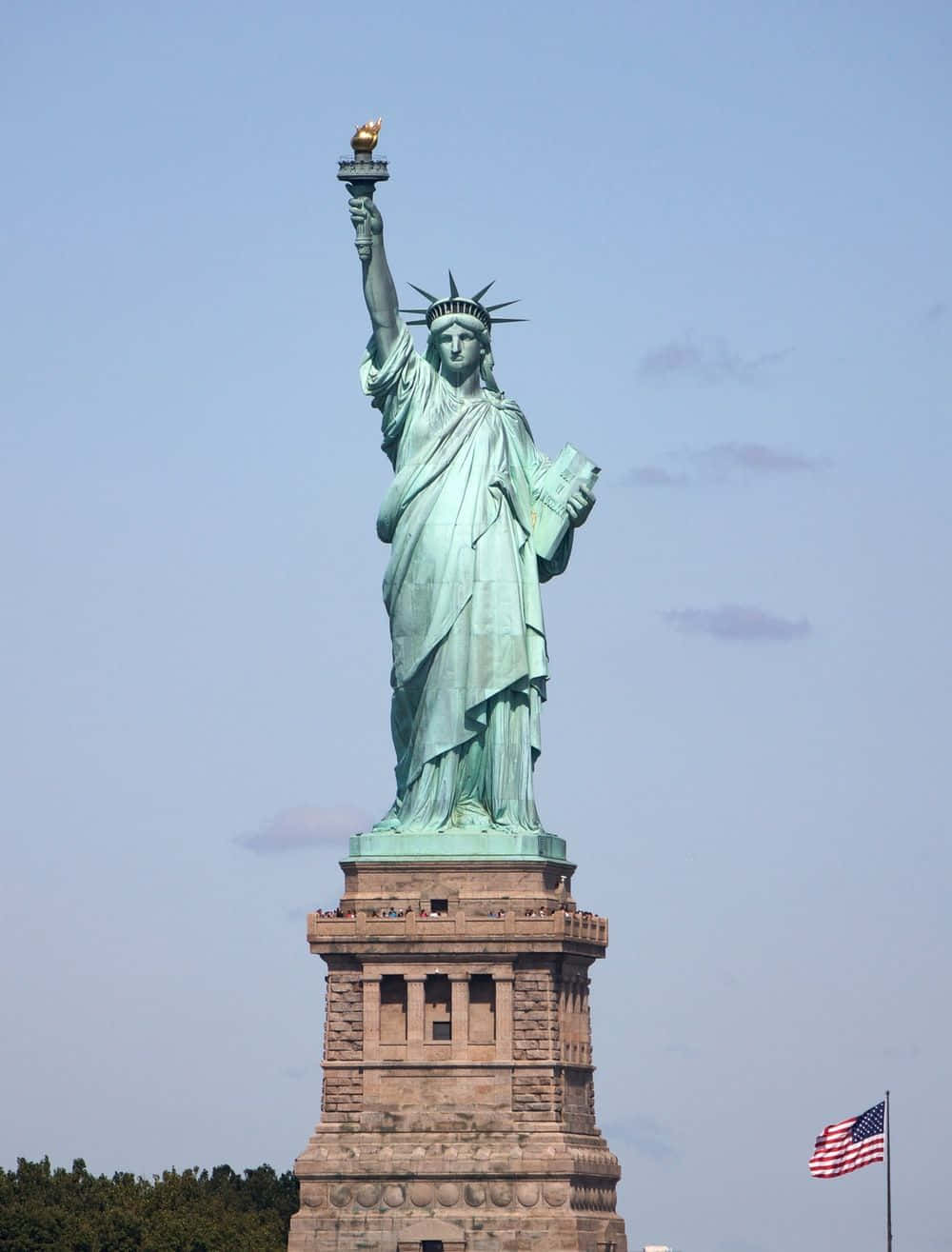 The iconic Statue of Liberty stands tall in New York harbor.
