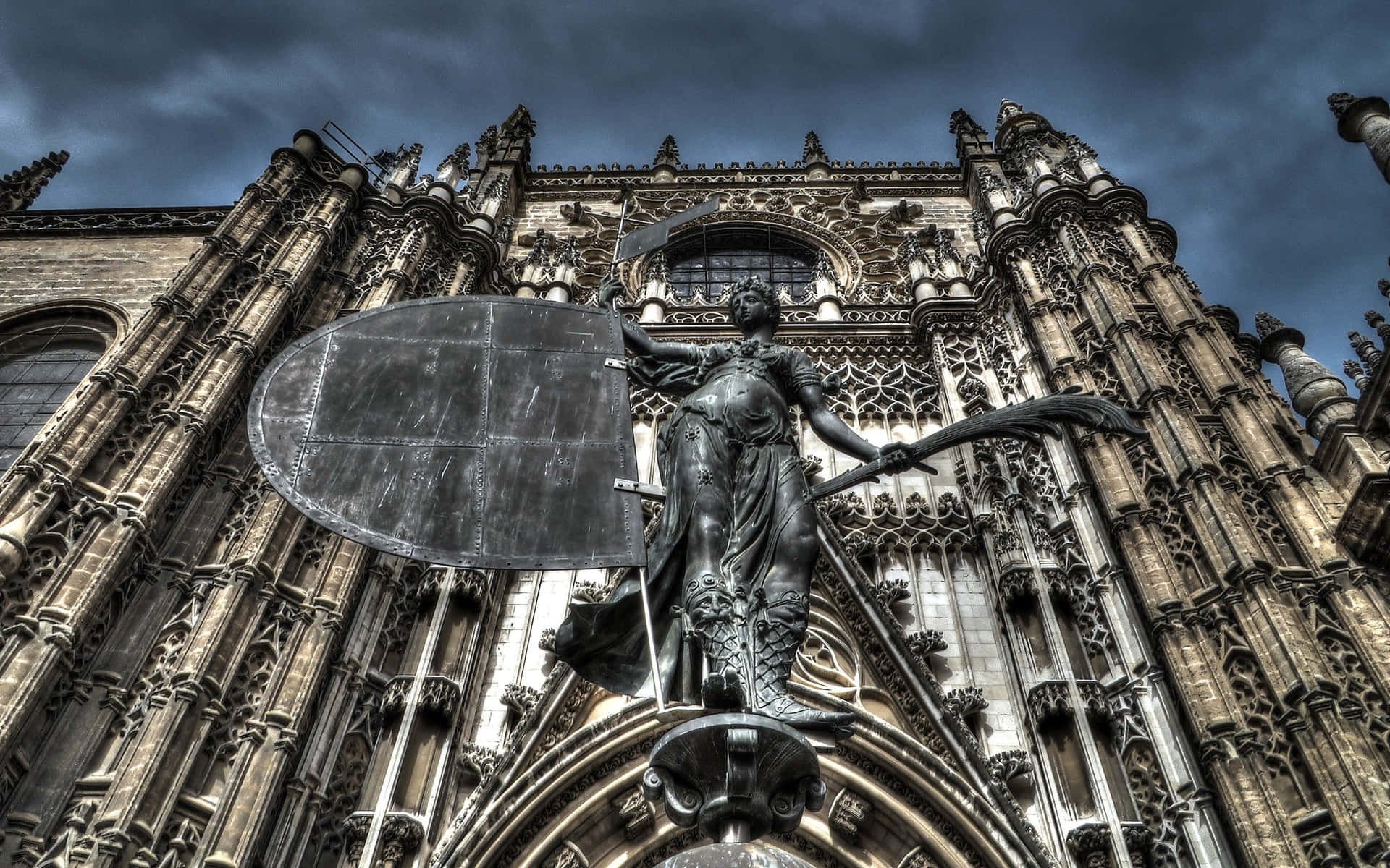Statue Outside The Seville Cathedral Wallpaper