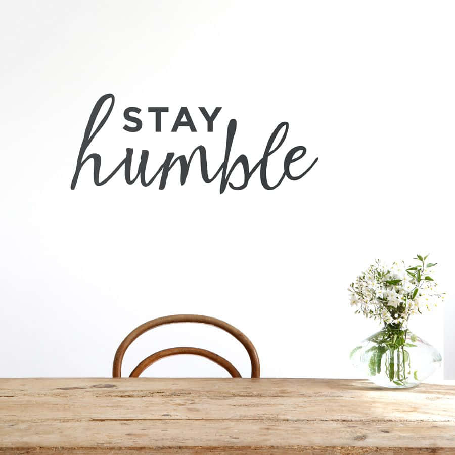 Table With A Stay Humble Quote Wallpaper