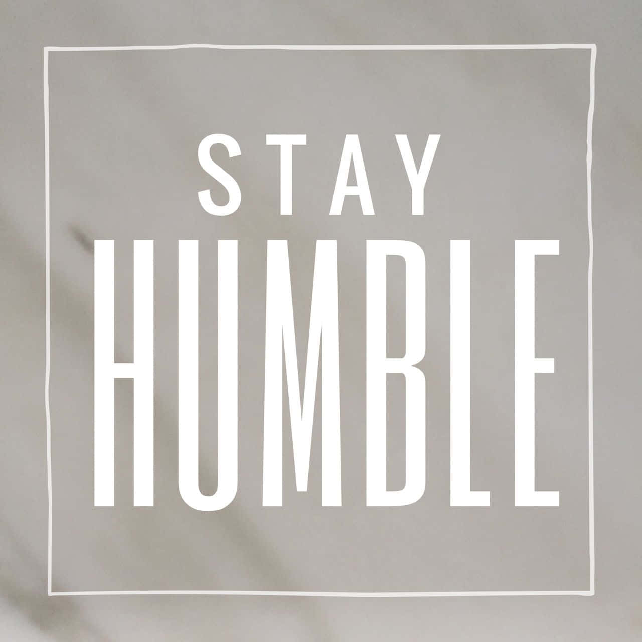 Stay Humble - A White And Black Sign With The Words Stay Humble Wallpaper