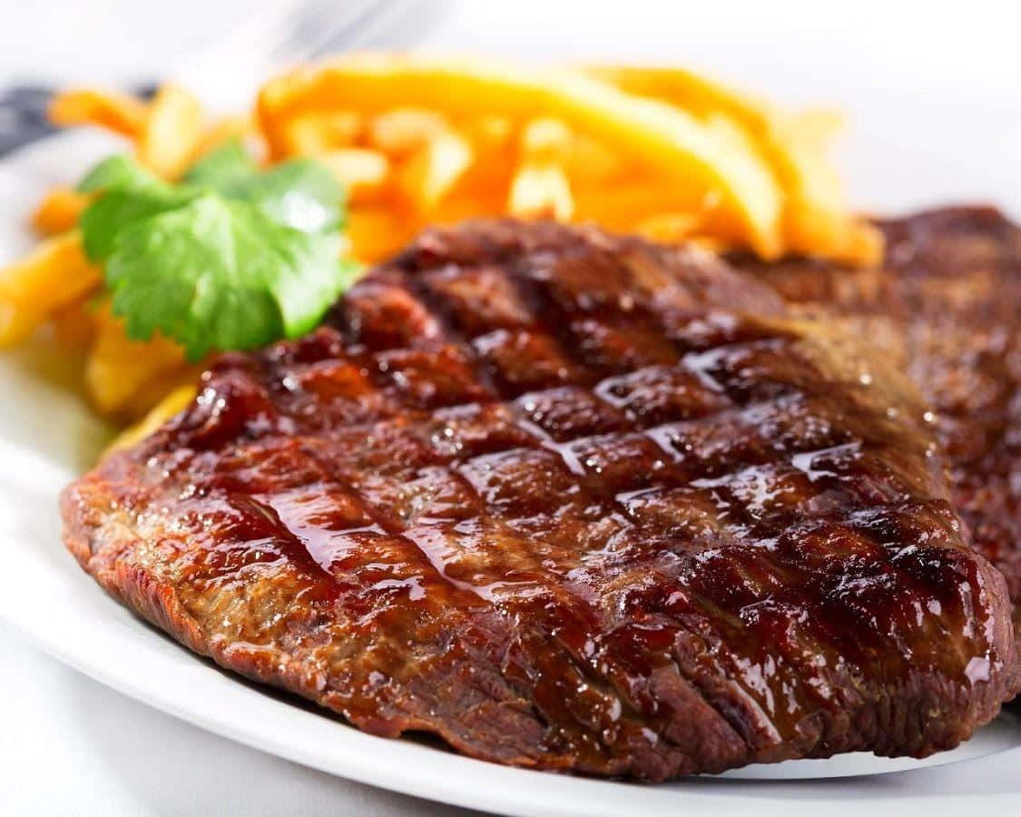 Succulent Grilled Steak on Wooden Cutting Board