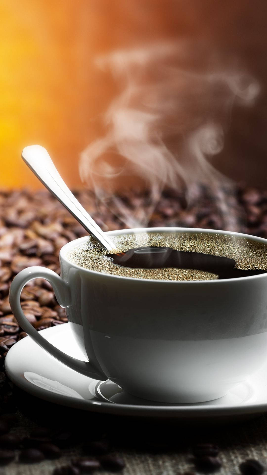 Steaming Dark Coffee In A Coffee Cup Wallpaper