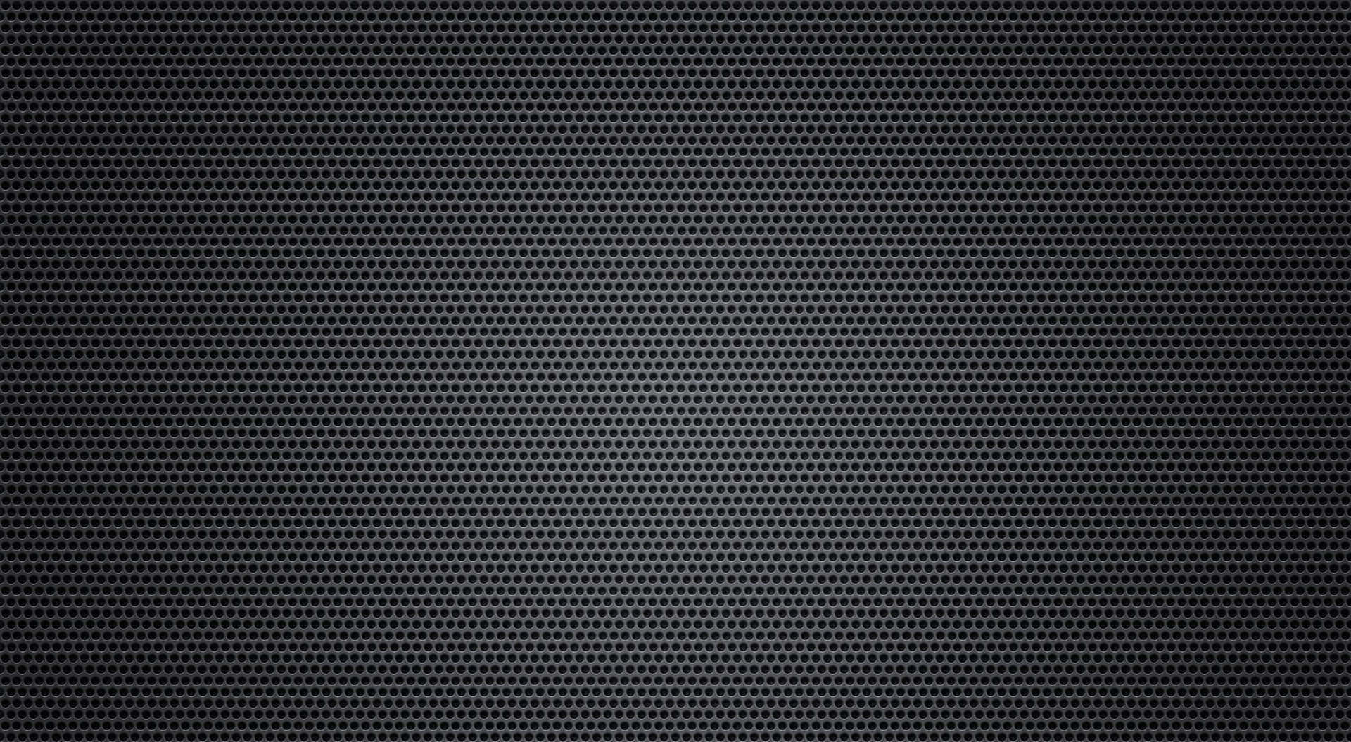 A Black Background With A Grid Pattern
