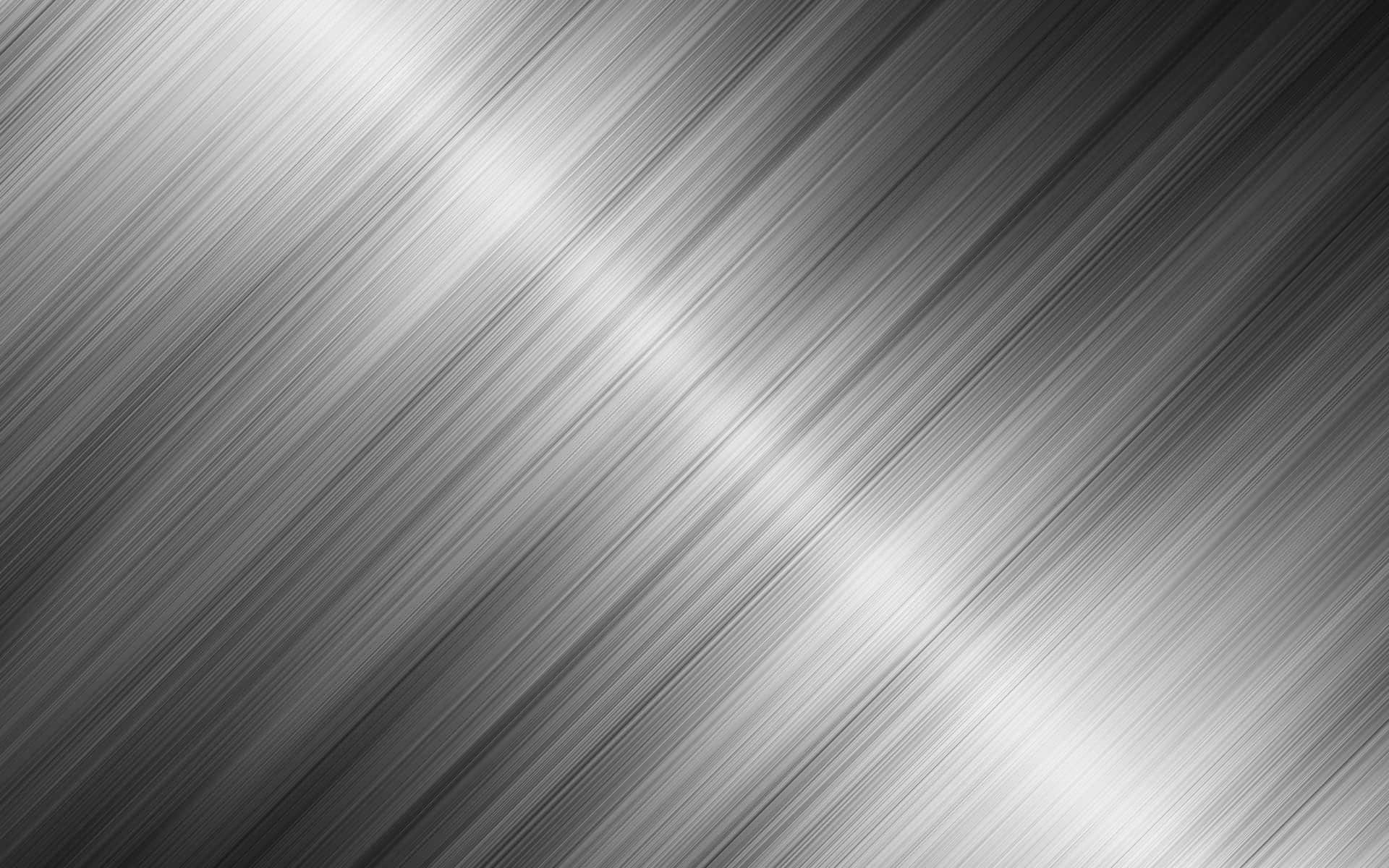 A Black And Silver Metal Background Wallpaper