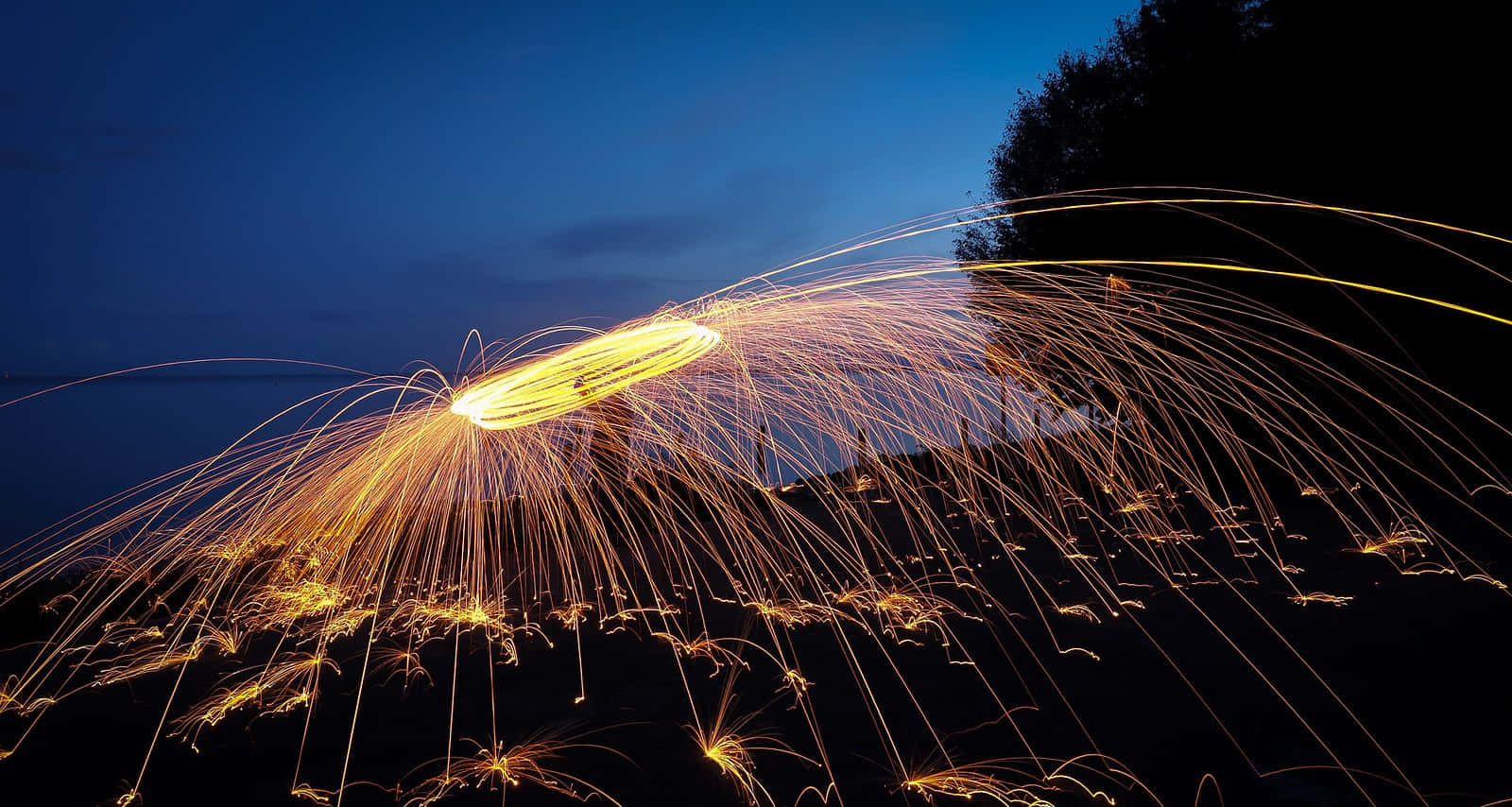 Steel Wool Spinningat Night Wallpaper