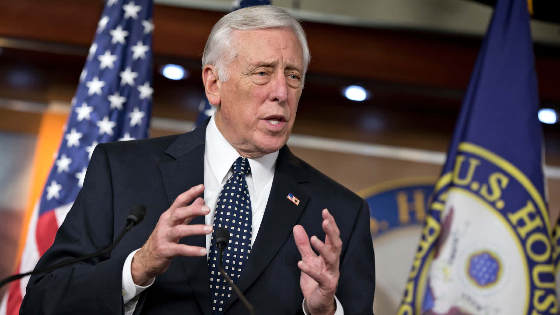 Steny Hoyer Talking With Flags Wallpaper