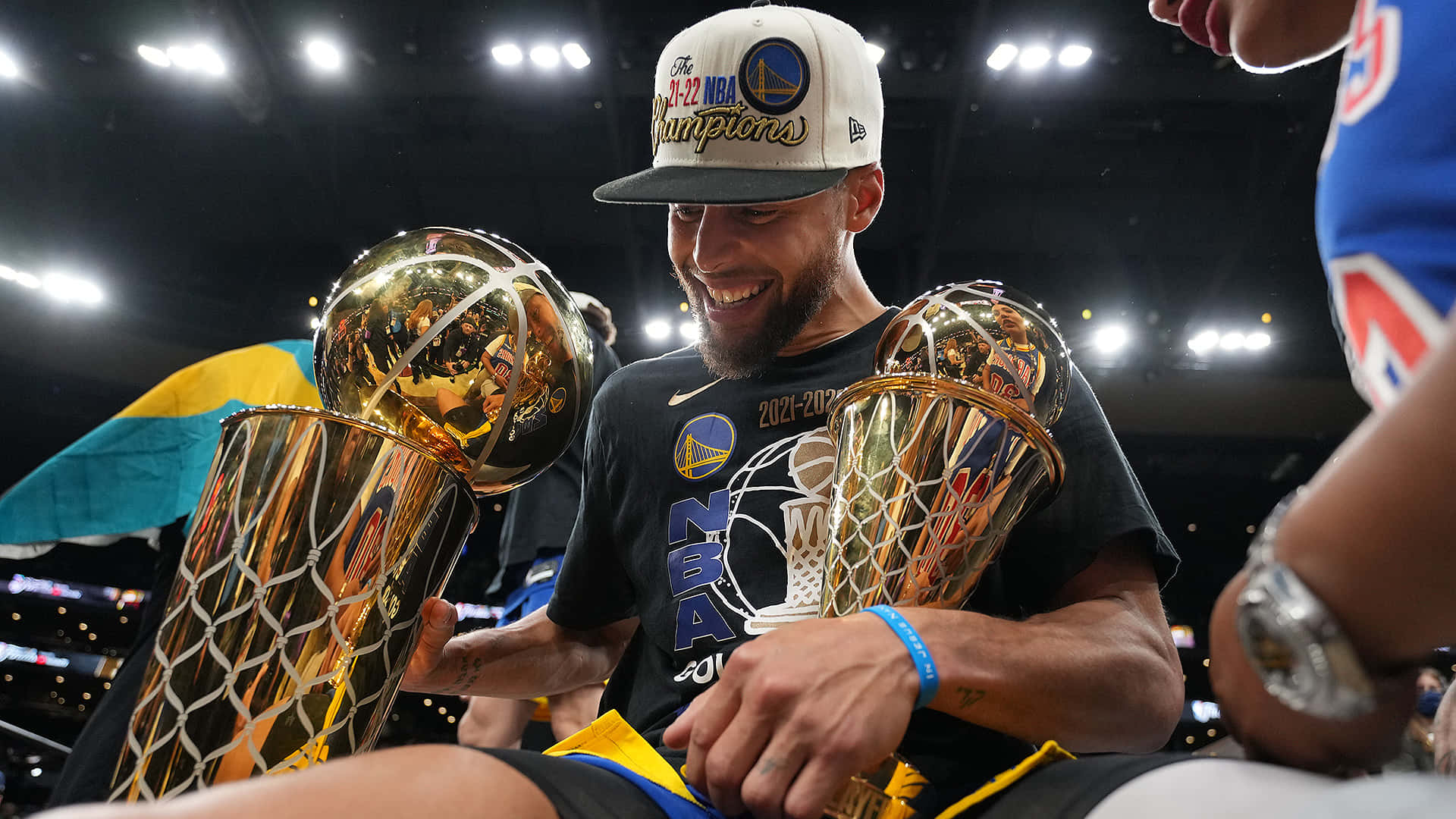 Golden State Warriors' star Stephen Curry dribbling the basketball down the court