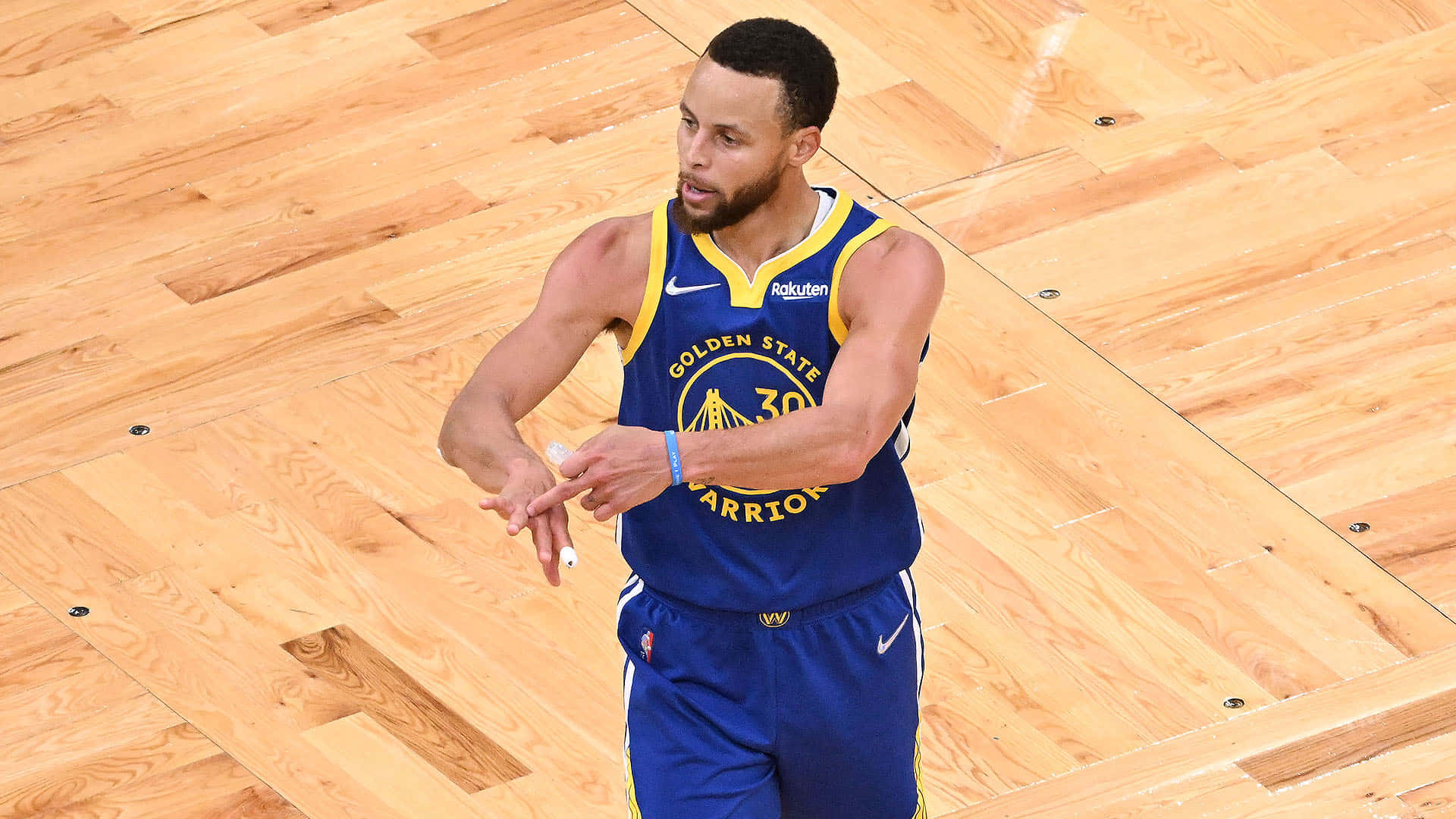 Golden State Warriors' Star Player, Stephen Curry, in action on the basketball court.