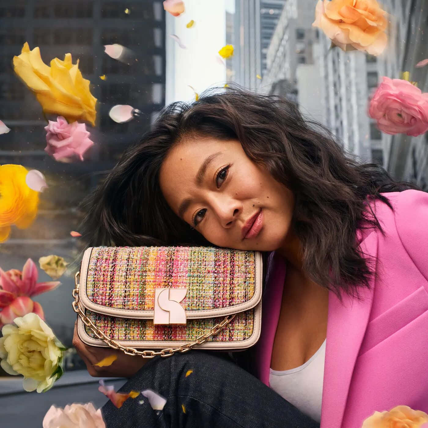 Stephanie Hsu With Floral Backdropand Handbag Wallpaper