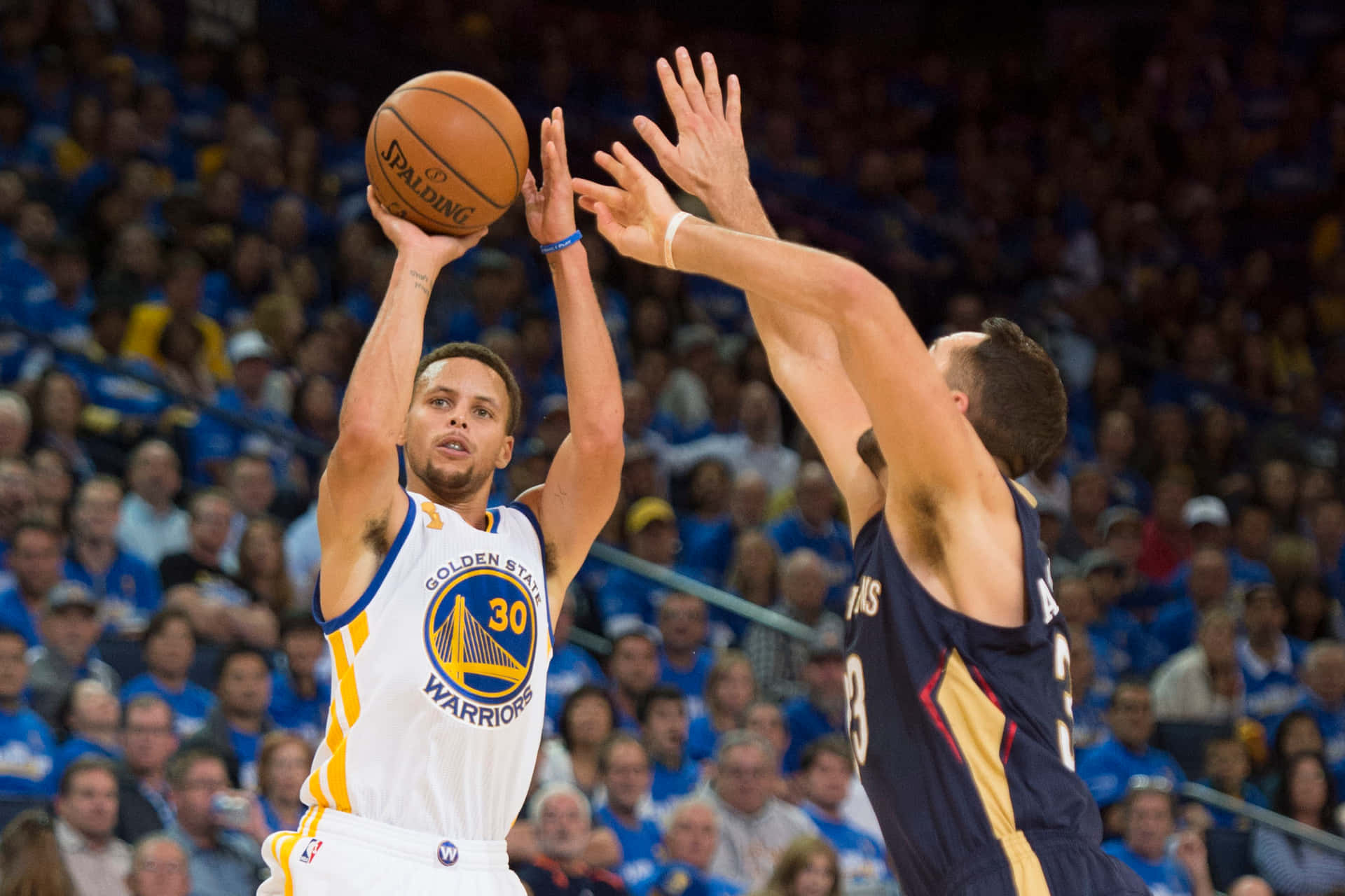 Stephen Curry making a jump shot during a basketball game