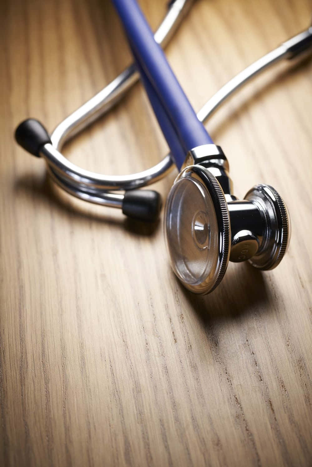 Medical stethoscope on a blue background