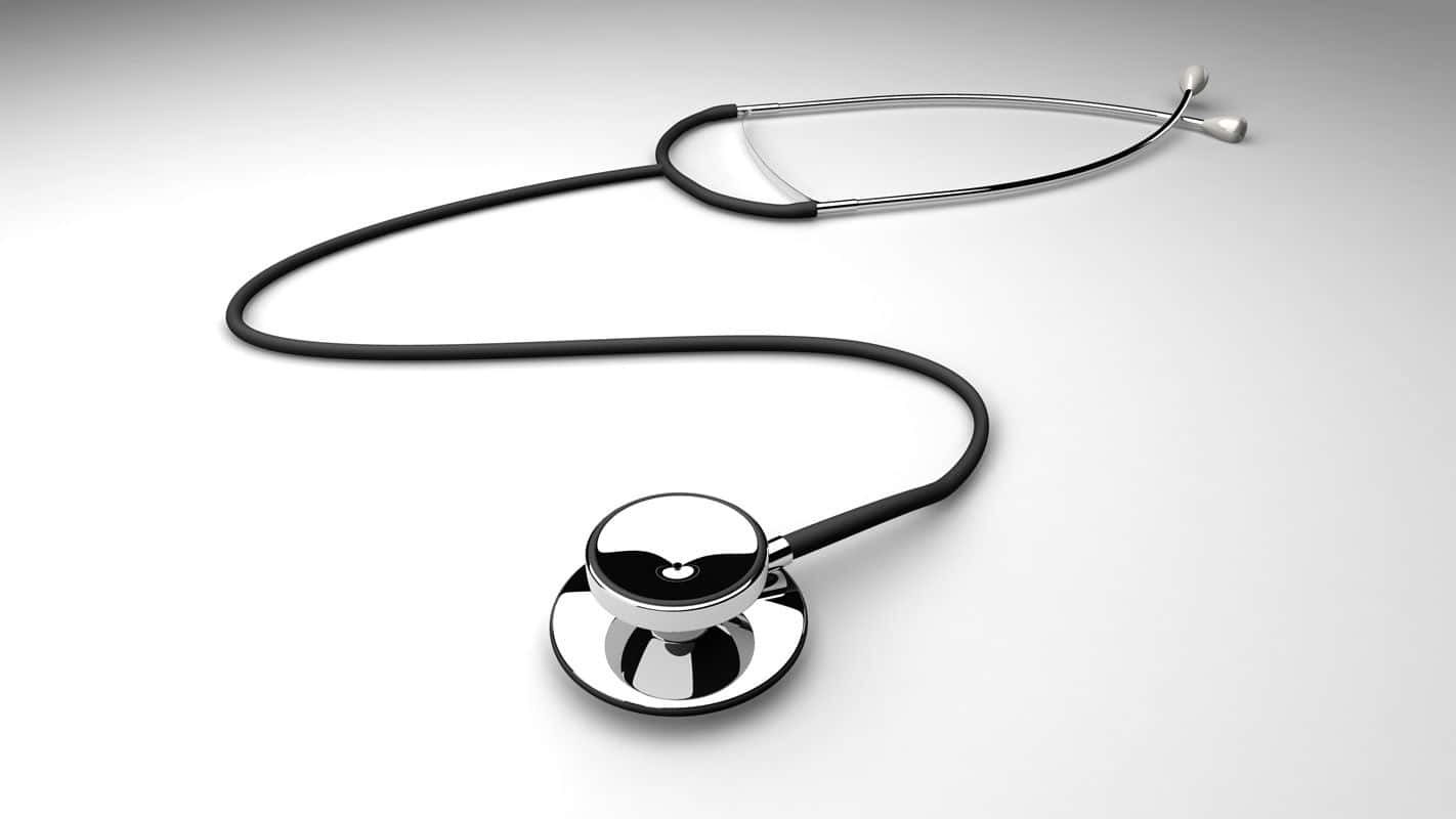 Close-up image of a stethoscope on a wooden surface
