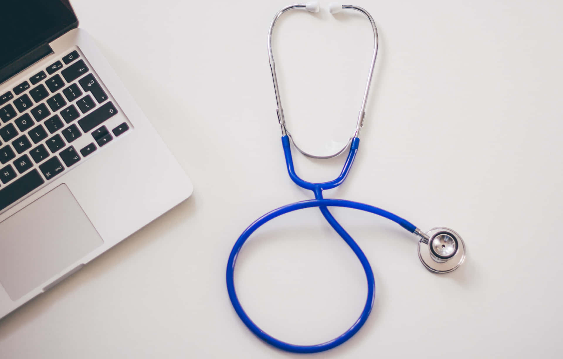 Close-up of a stethoscope on a wooden surface