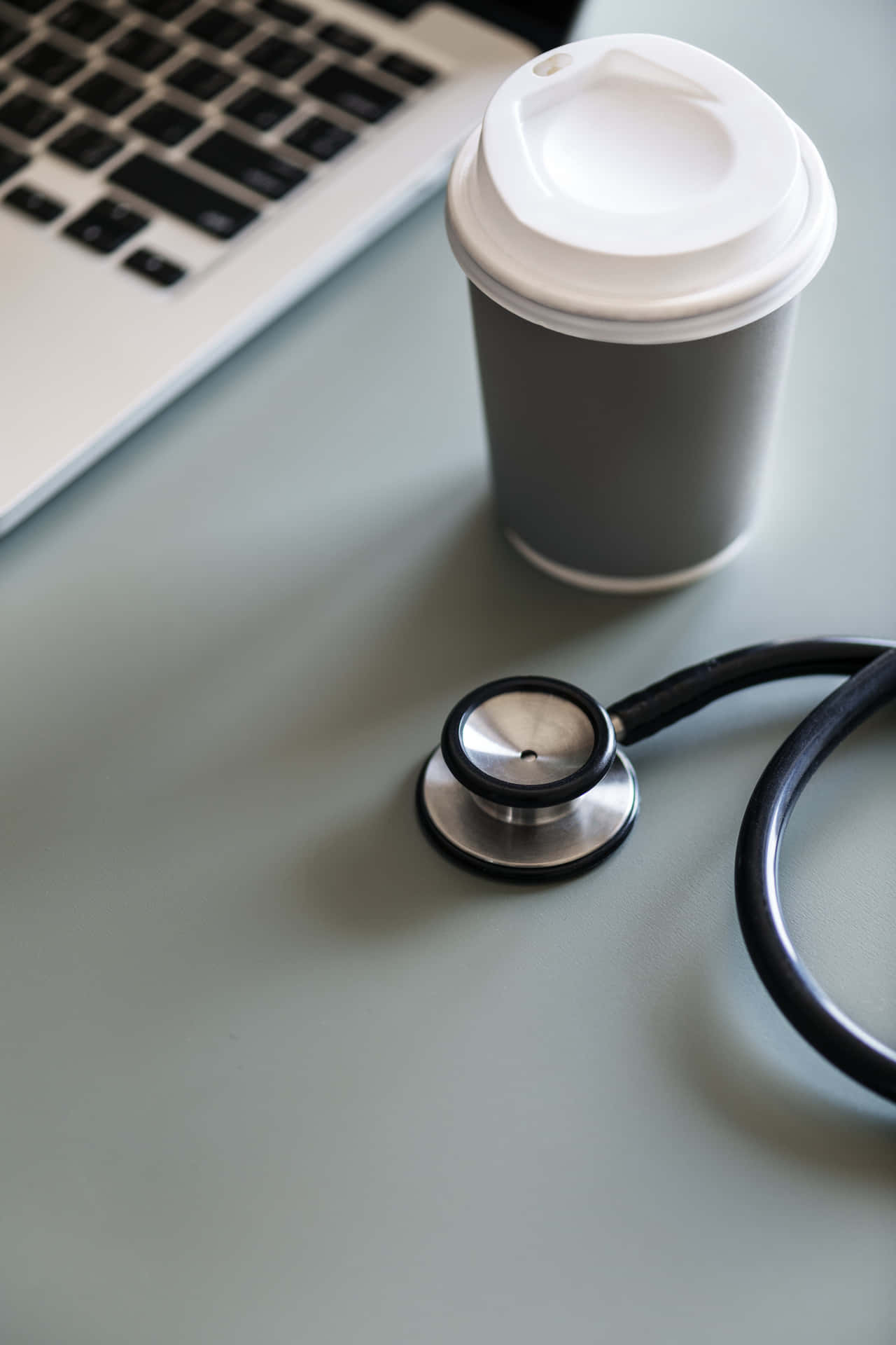 Professional stethoscope on a surface