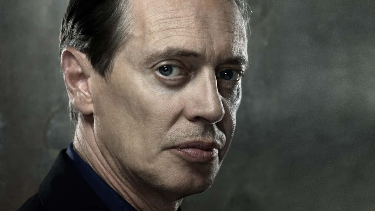 Intense portrait of American actor Steve Buscemi. Wallpaper