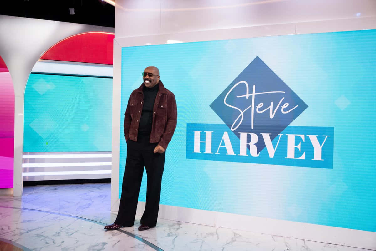 Steve Harvey In Brown And Black Background