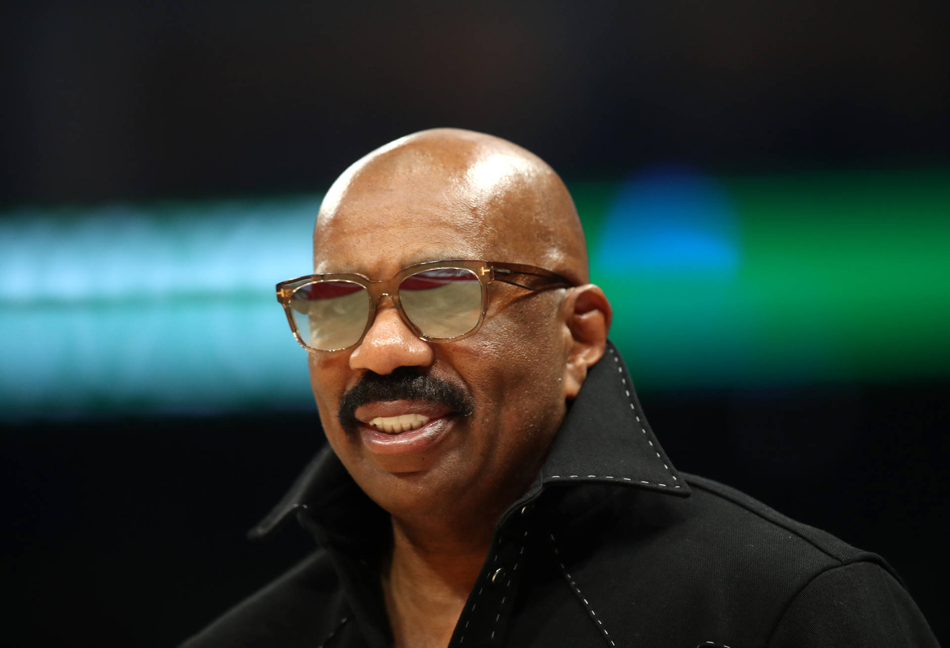 Steve Harvey Smiling In Coat And Sunglasses Picture