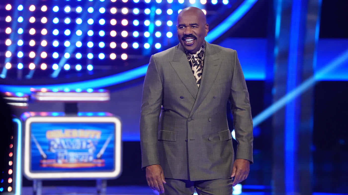 Steve Harvey With Blue Game Show Backdrop Picture