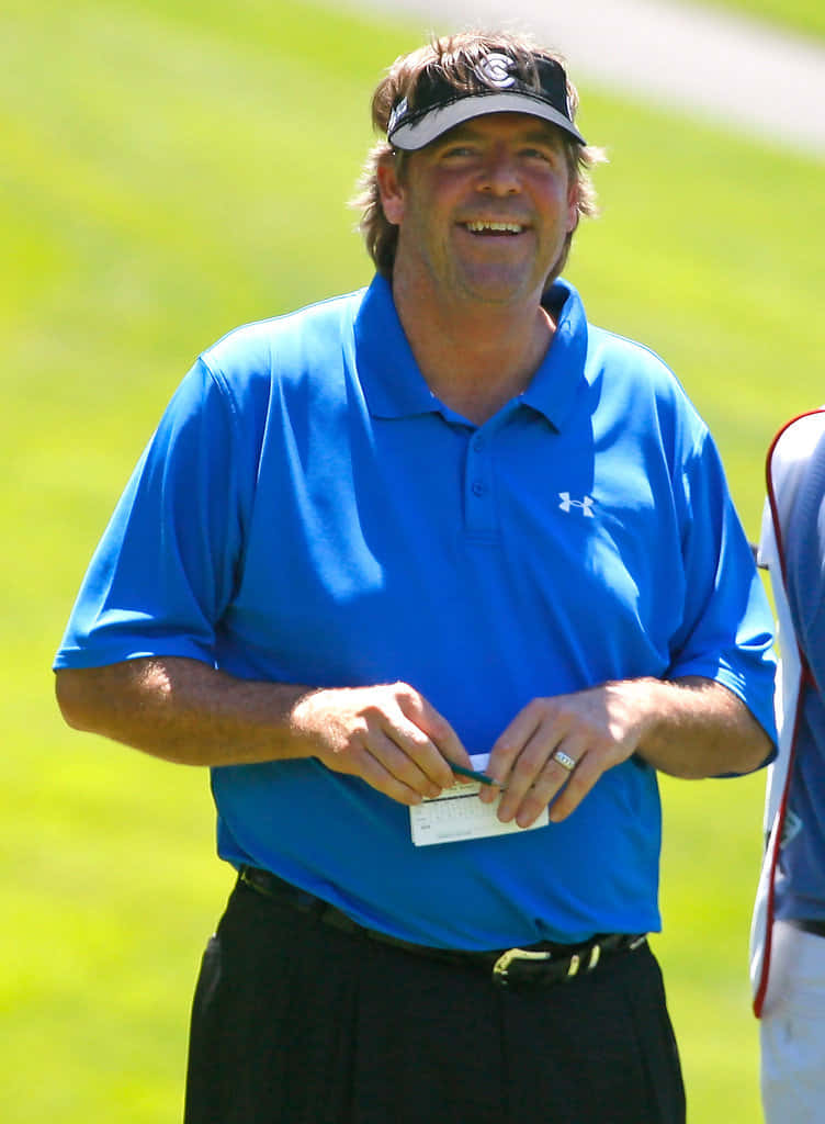 Steve Lowery Holding Golf Scorecard Wallpaper