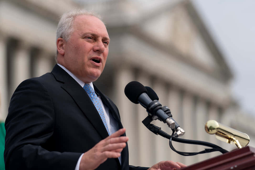 Steve Scalise With Microphones Background