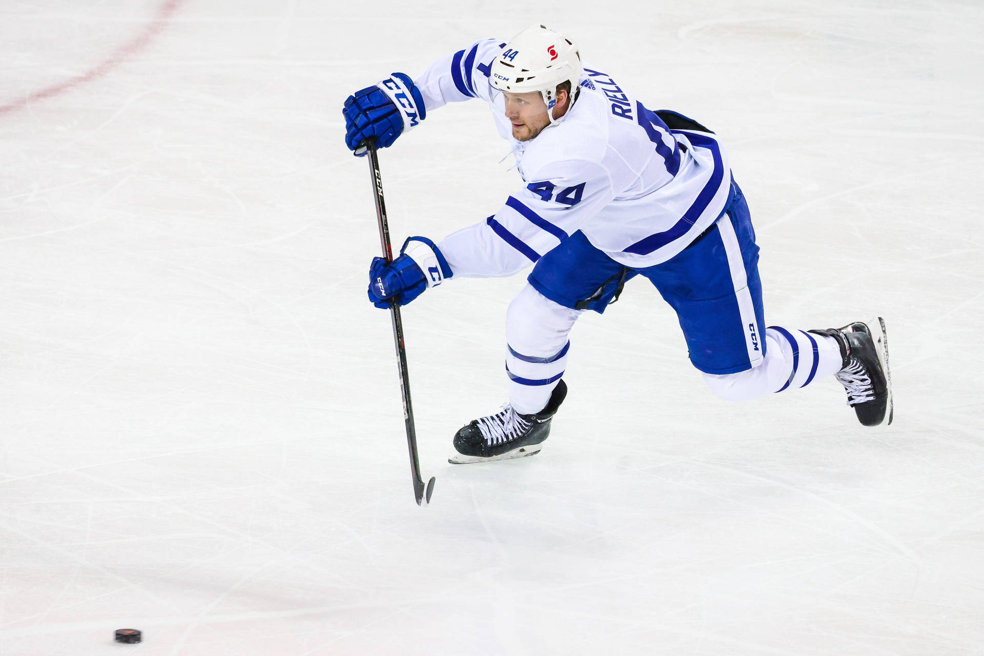 Morgan Rielly, master of the puck, in action on the ice Wallpaper