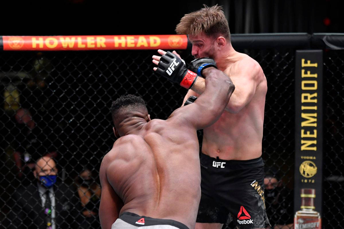 Stipe Miocic Punched By Ngannou Wallpaper