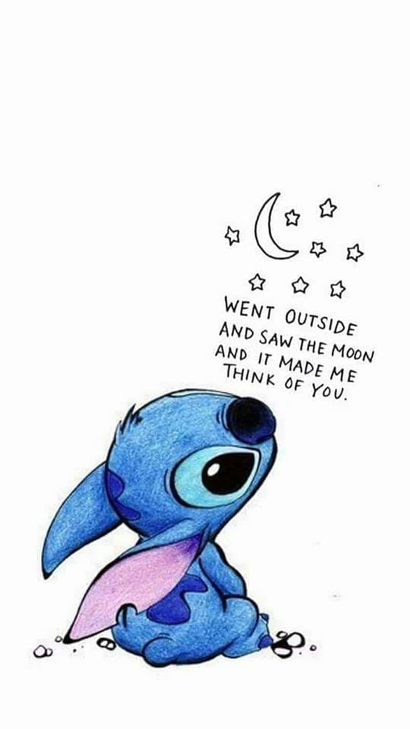 A Cartoon Stitch Sitting On The Ground With The Words, Wet Stitch And The Moon'' Wallpaper