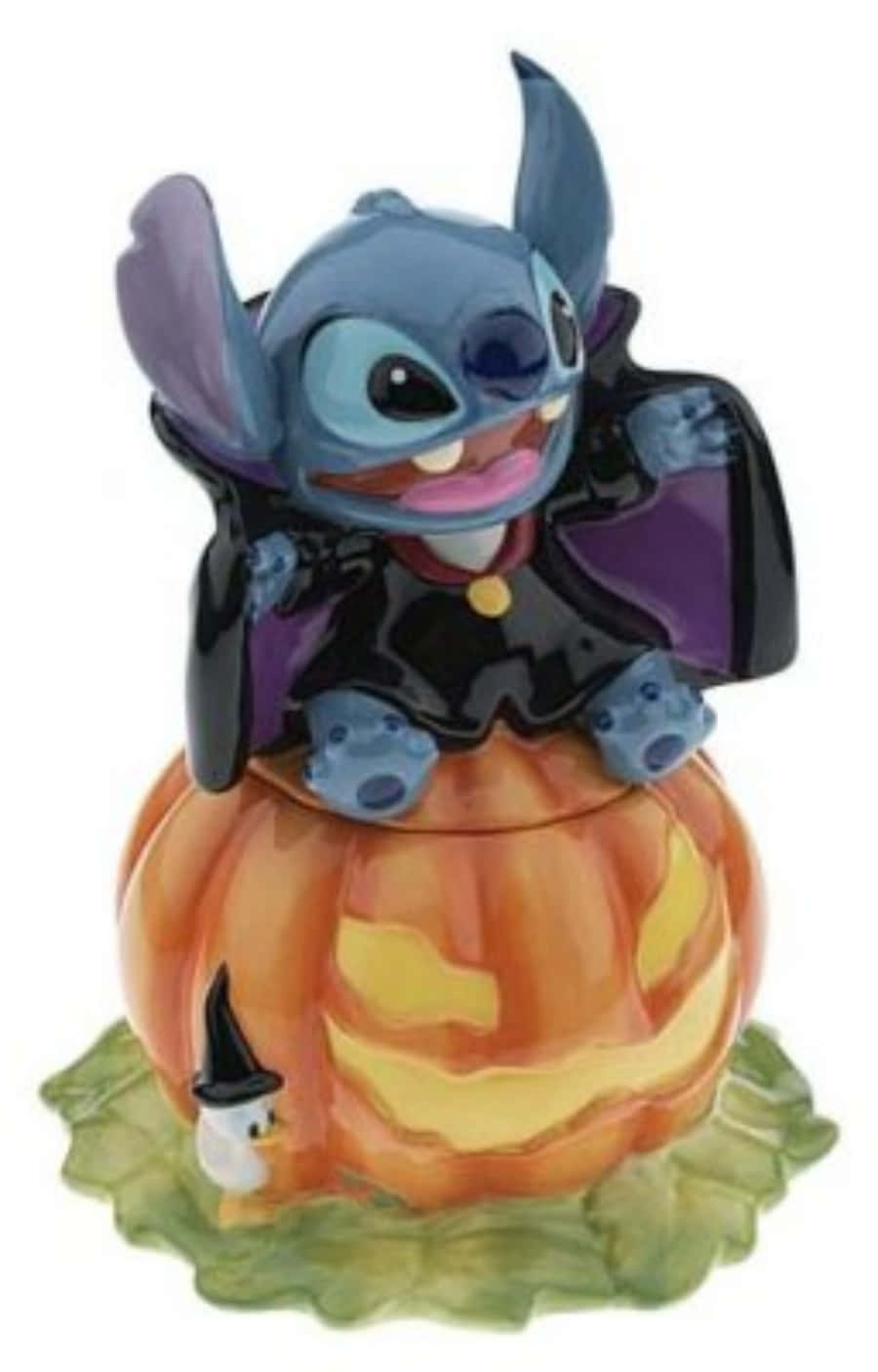 Stitch Sitting Over Halloween Pumpkin Wallpaper