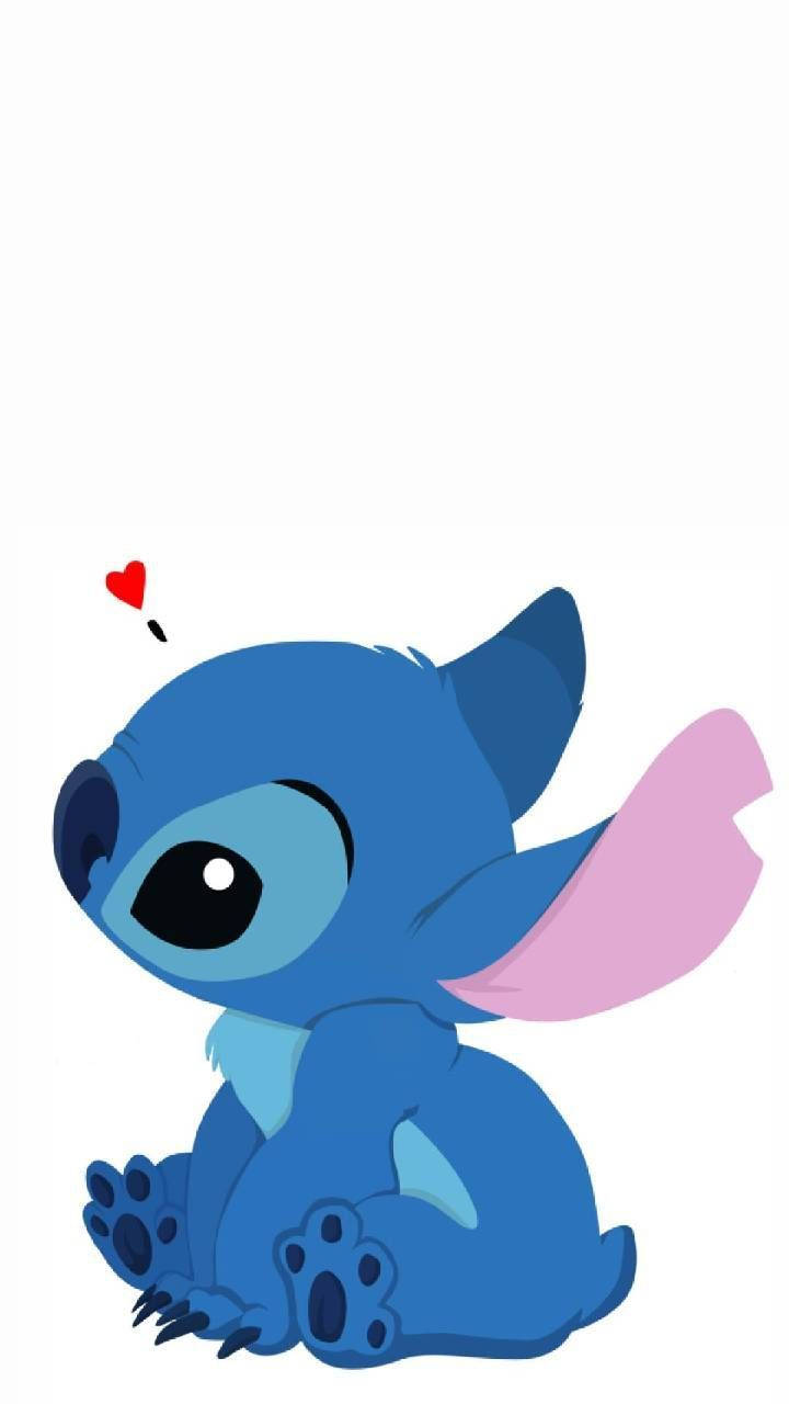 Stitch sitting with a mini heart popping over his head wallpaper.
