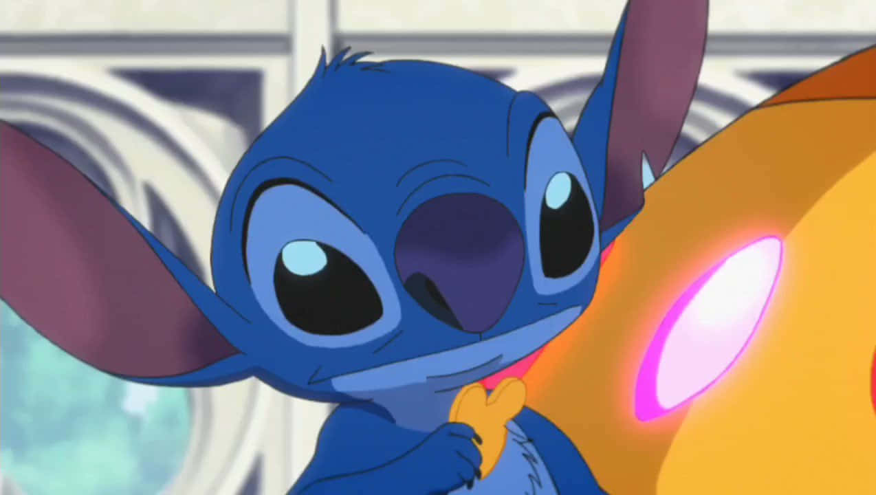 A close up profile view of the adorable alien Stitch