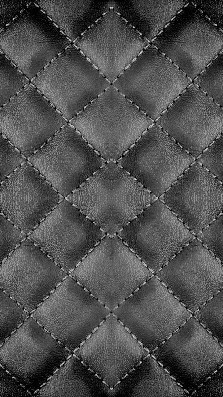 Stitched Upholstery Made Of Black Leather iPhone Wallpaper