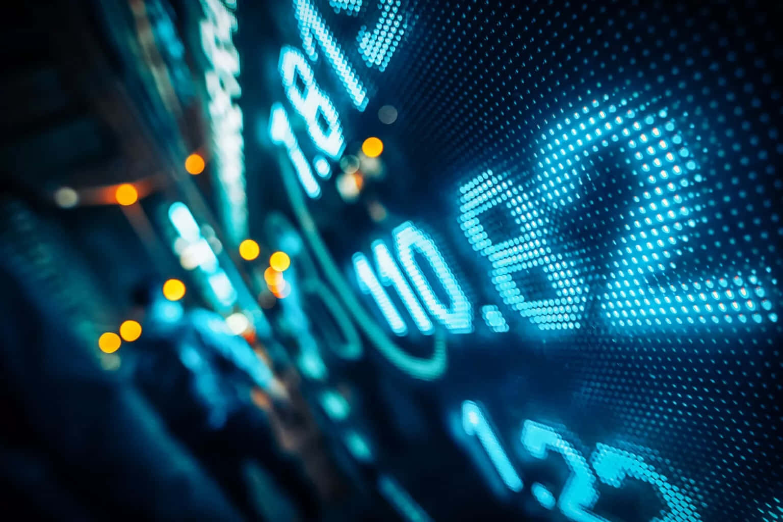 A Stock Market Display With A Blue Background