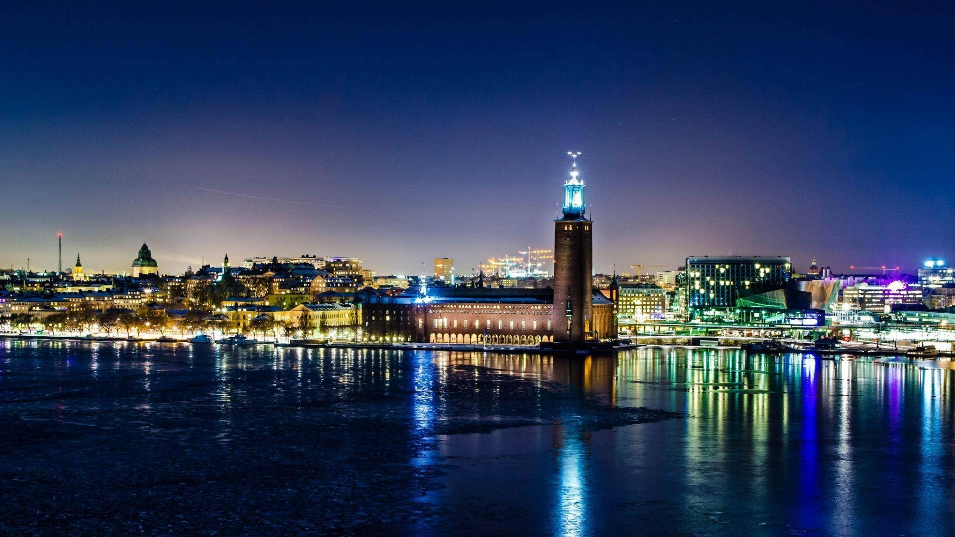 "The stunning Stockholm City Hall illuminated at night" Wallpaper