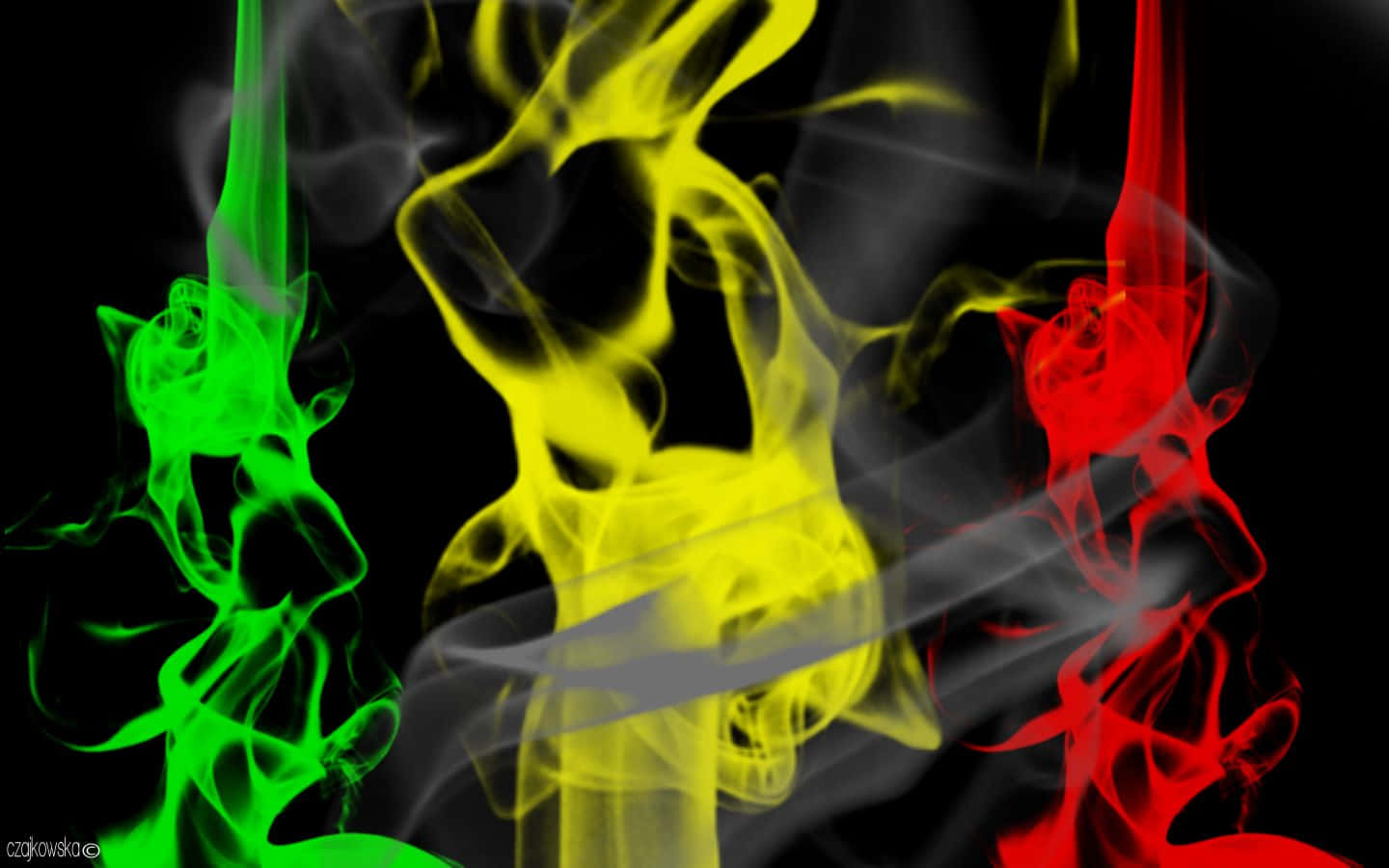 A Red, Yellow And Green Smoke Is Shown On A Black Background Wallpaper