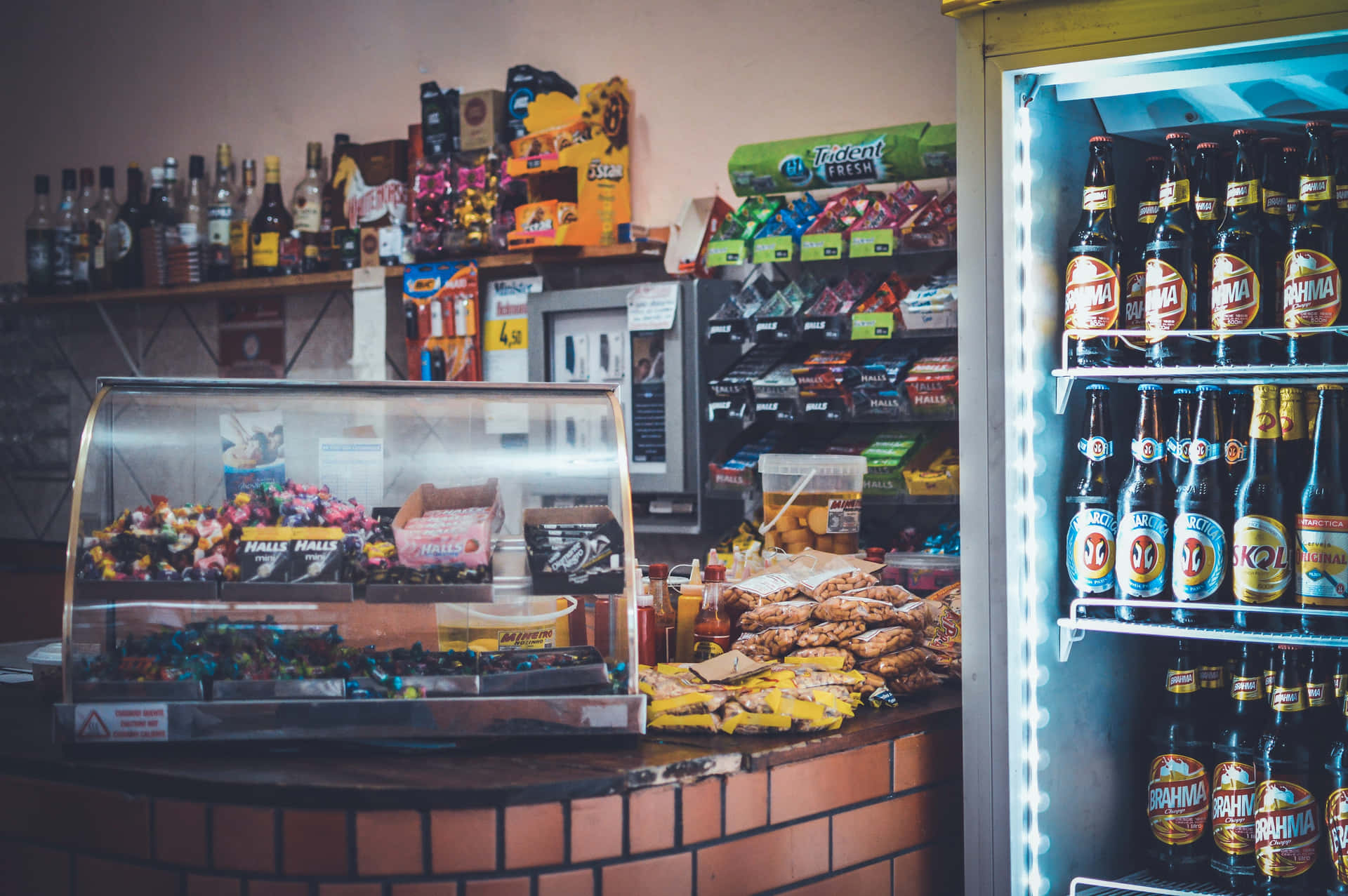 A Refrigerator With Beer And Snacks